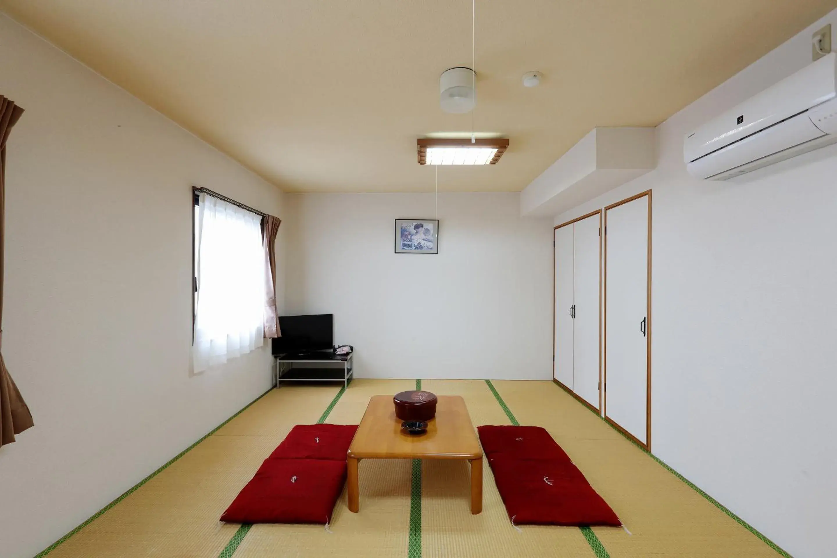 Bedroom in Tabist Rays Hotel Suisen