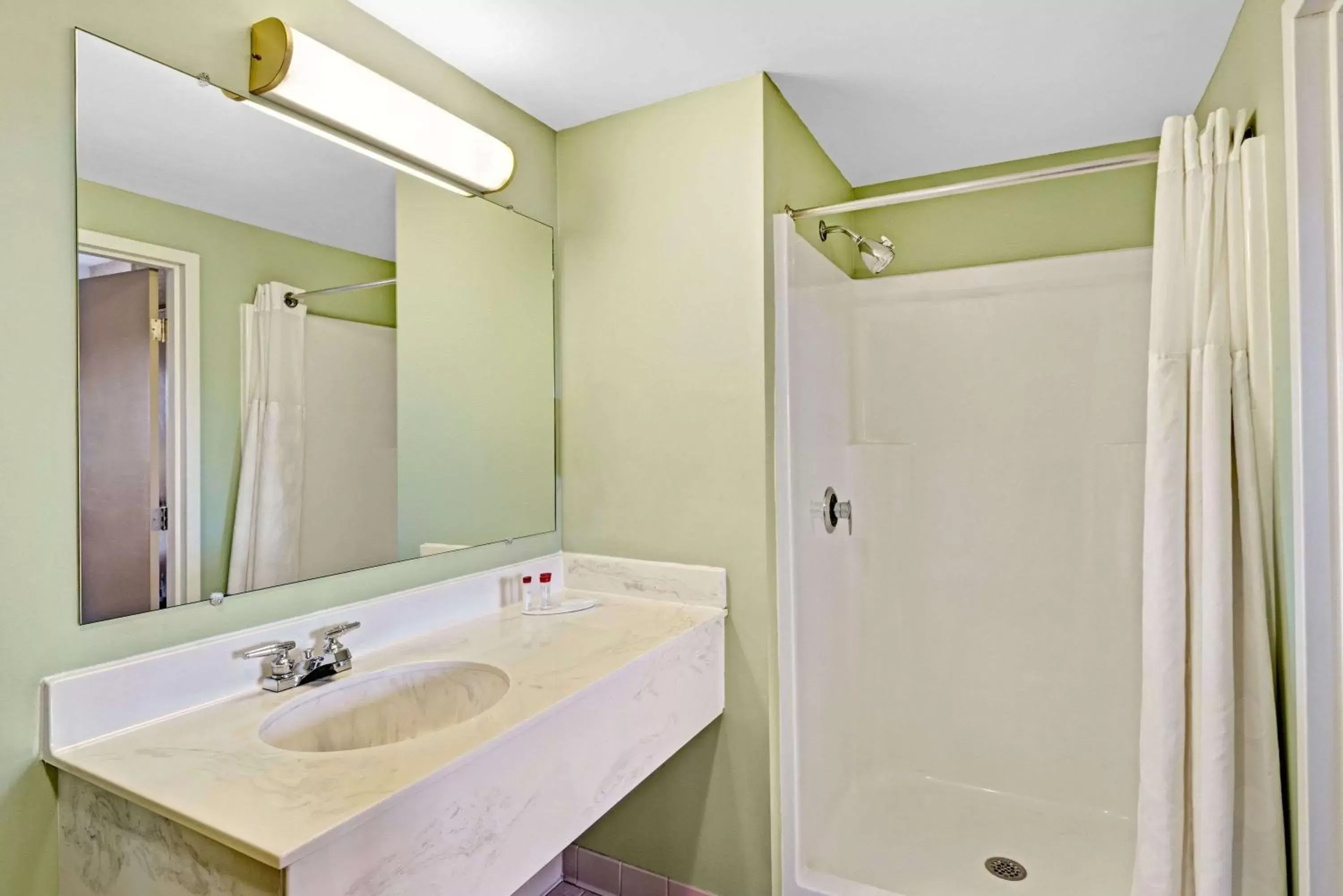 Bathroom in Ramada by Wyndham Saco/Old Orchard Beach Area