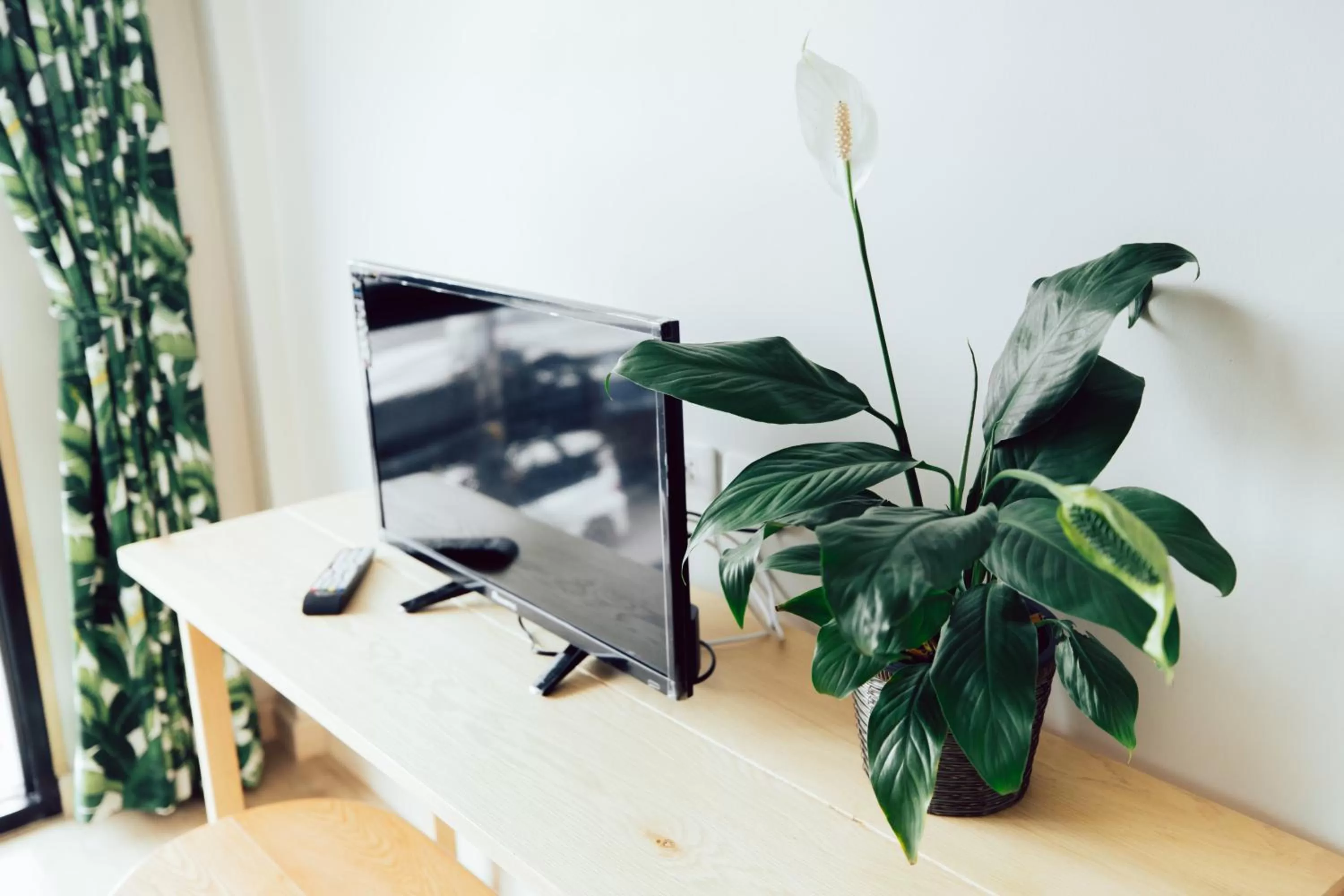 TV and multimedia, TV/Entertainment Center in J's Cafe and Poshtel