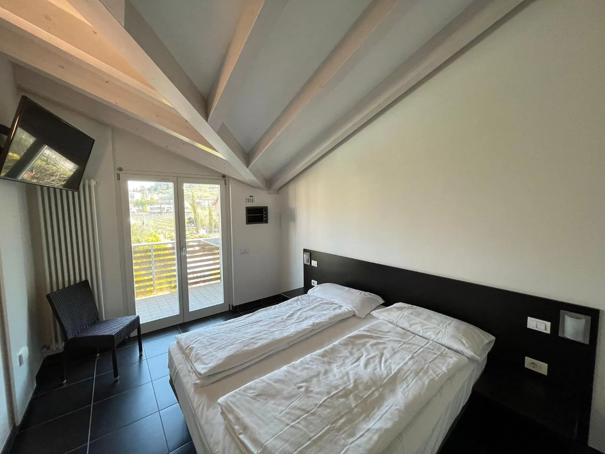 Bed in 4 Limoni Apartment Resort