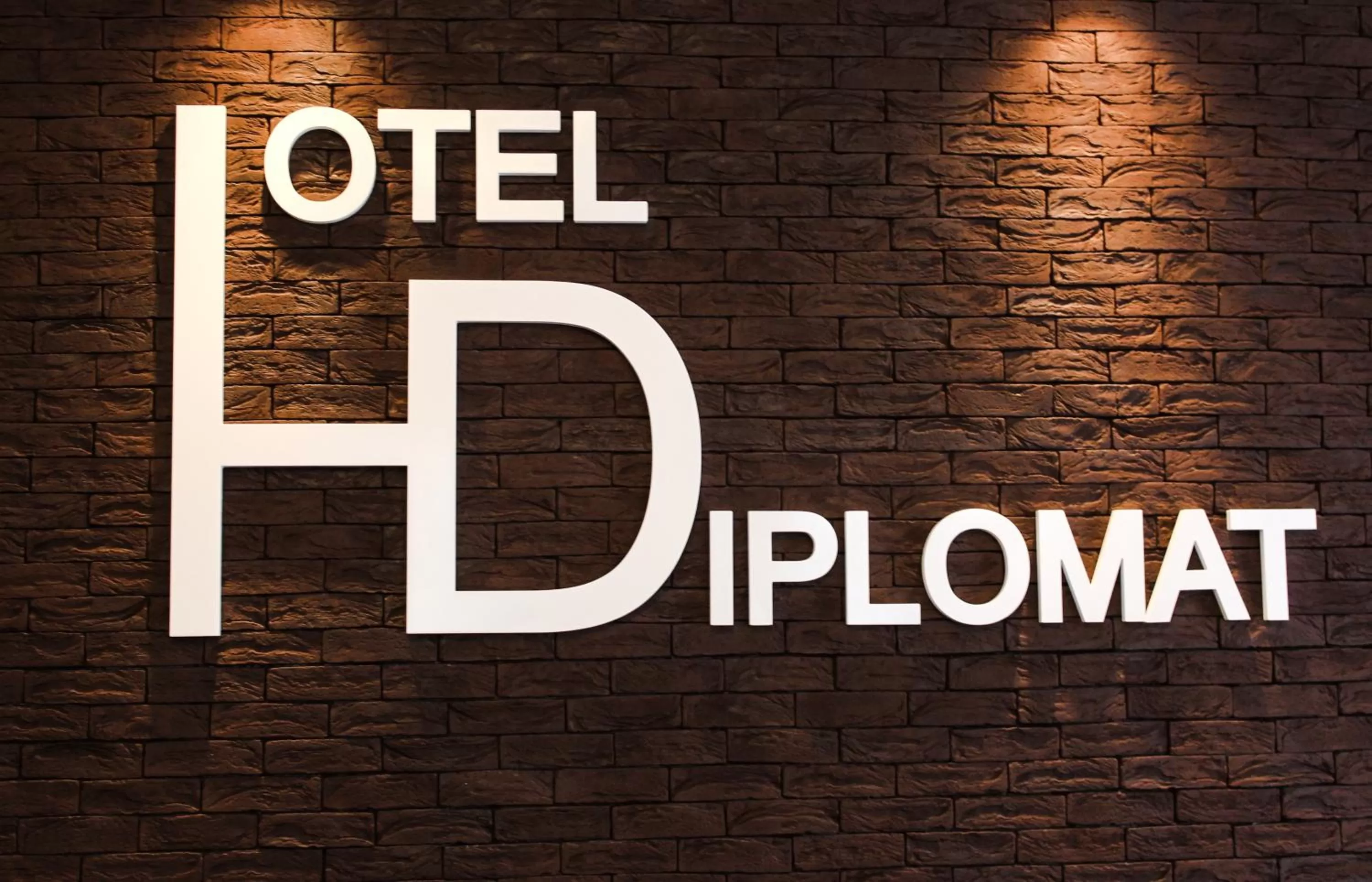Property logo or sign in Hotel Diplomat