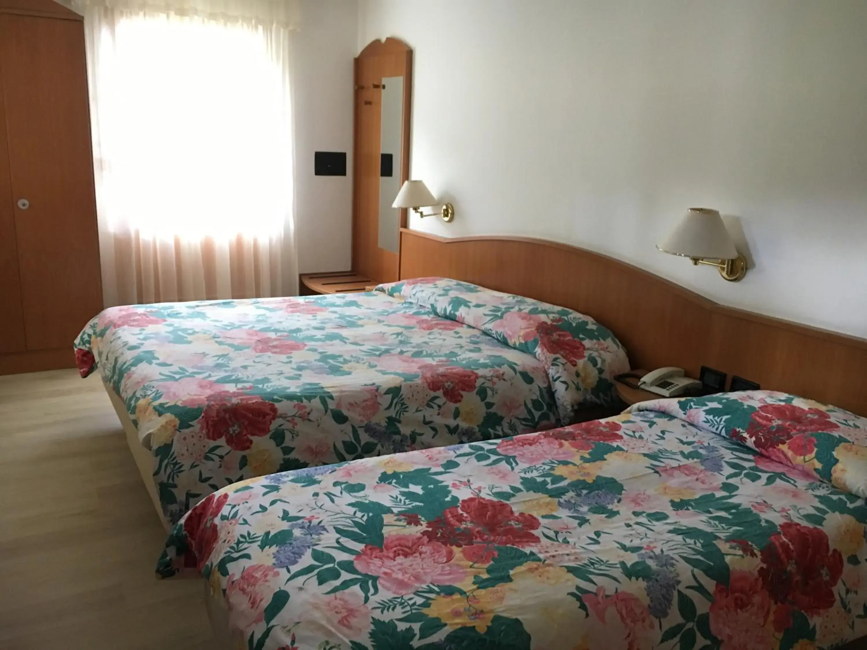 Bedroom in Garni Enrosadira