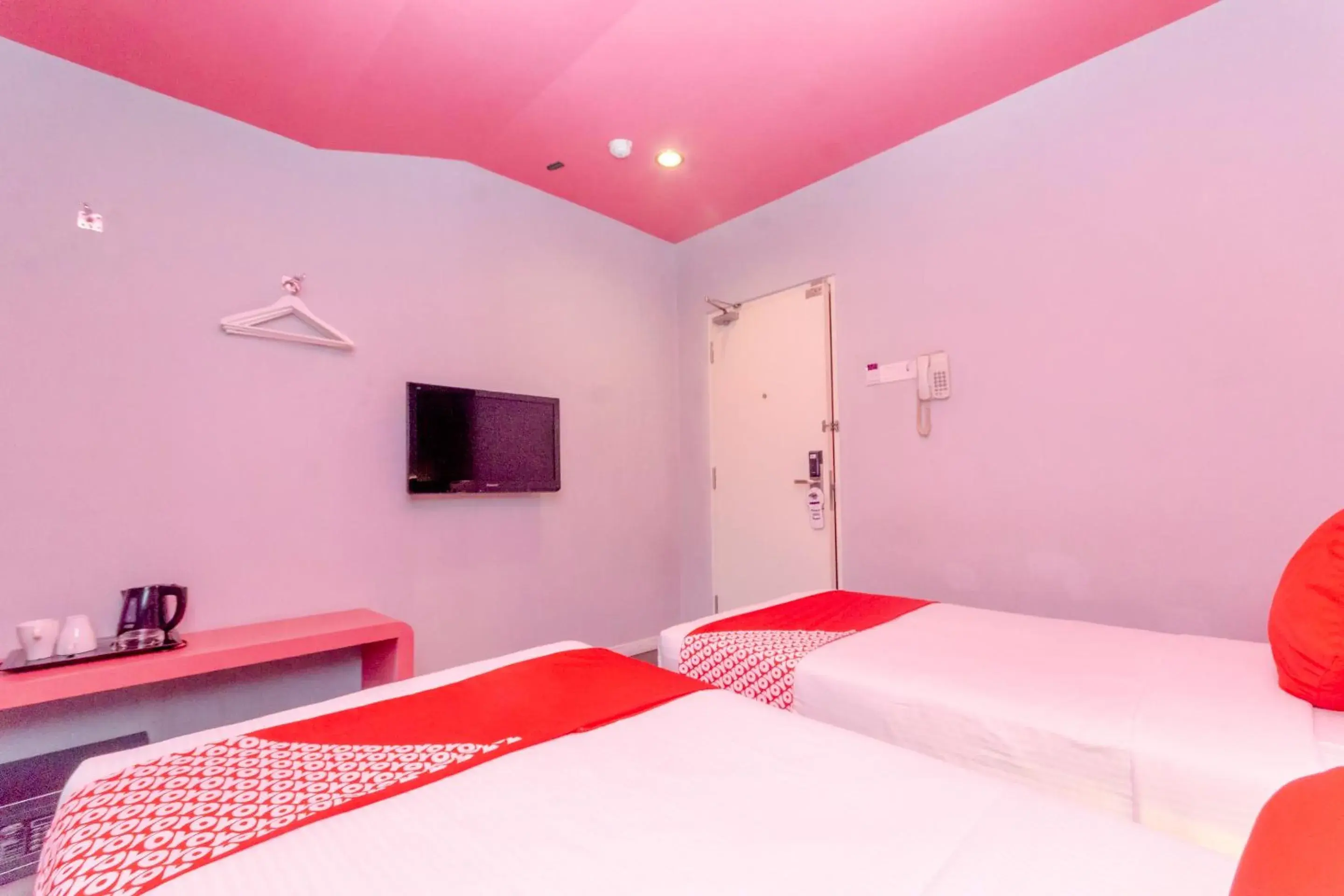 Bedroom, Bed in OYO 902 Rooms Boutique Hotel