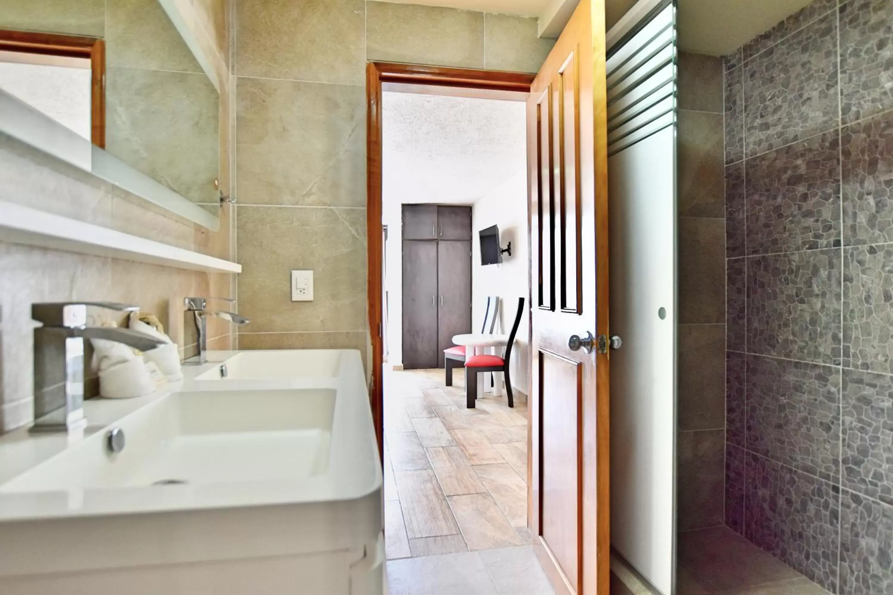 Bathroom in Solymar Condo Beach Resort by Casago