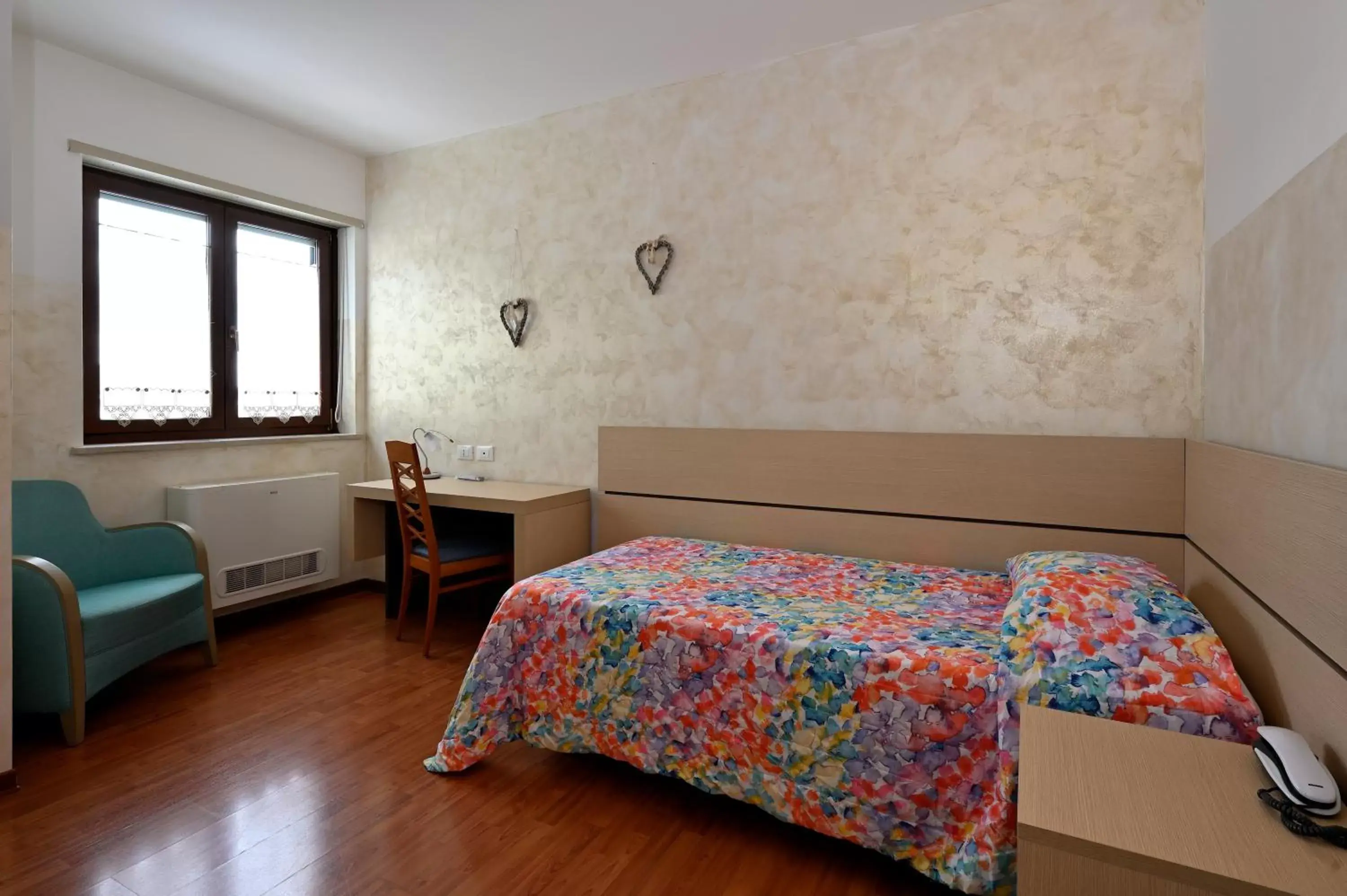 Bed in Hotel Italia