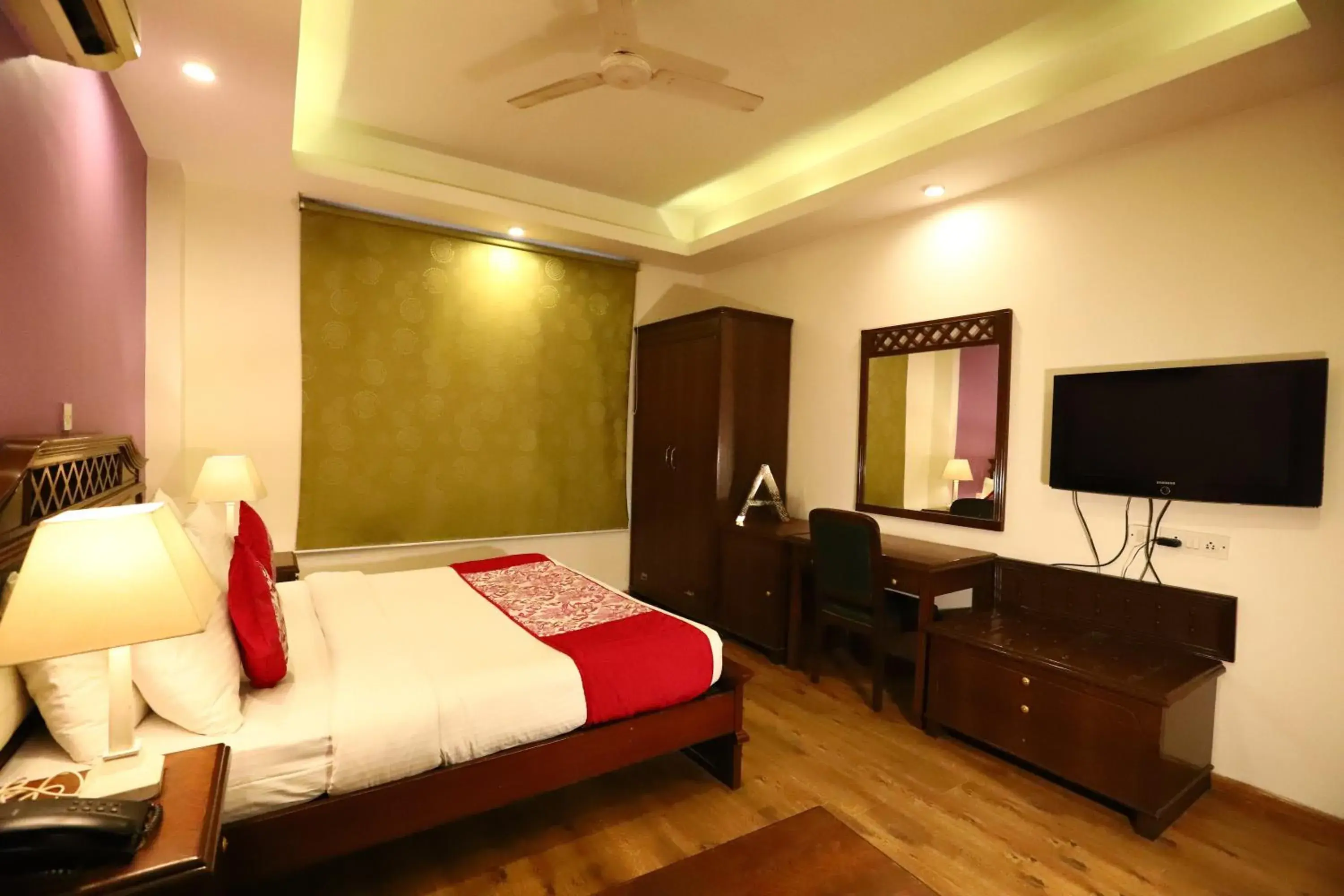 Photo of the whole room, TV/Entertainment Center in Hotel Ambica Palace