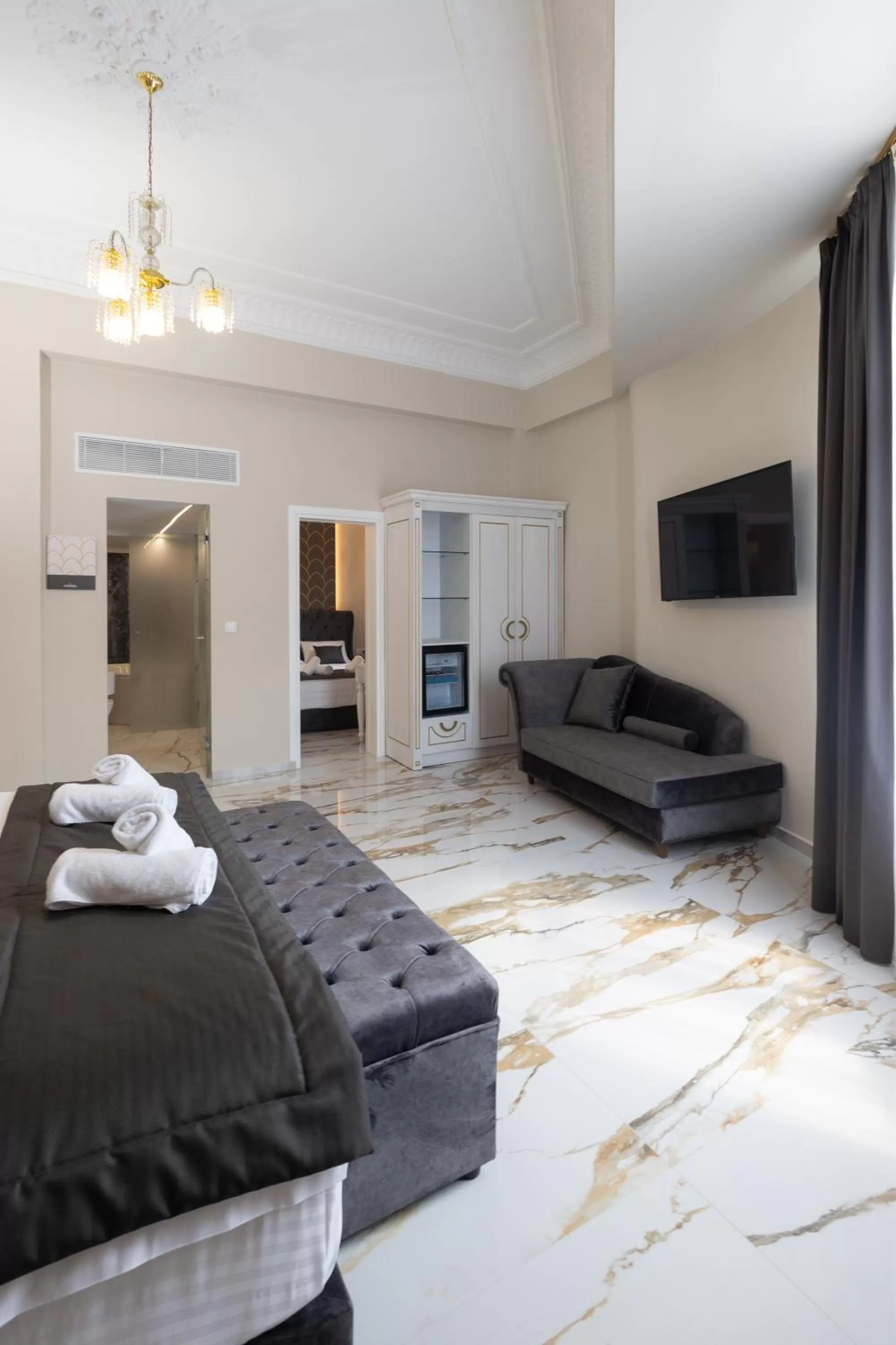 Bed in Modern Revival Luxury Hotel