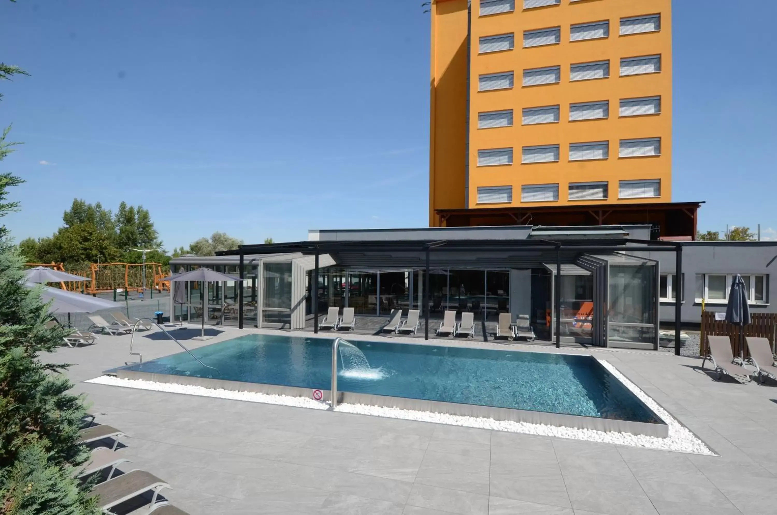 Property building, Swimming Pool in Hotel Aura Design & Garden Pool