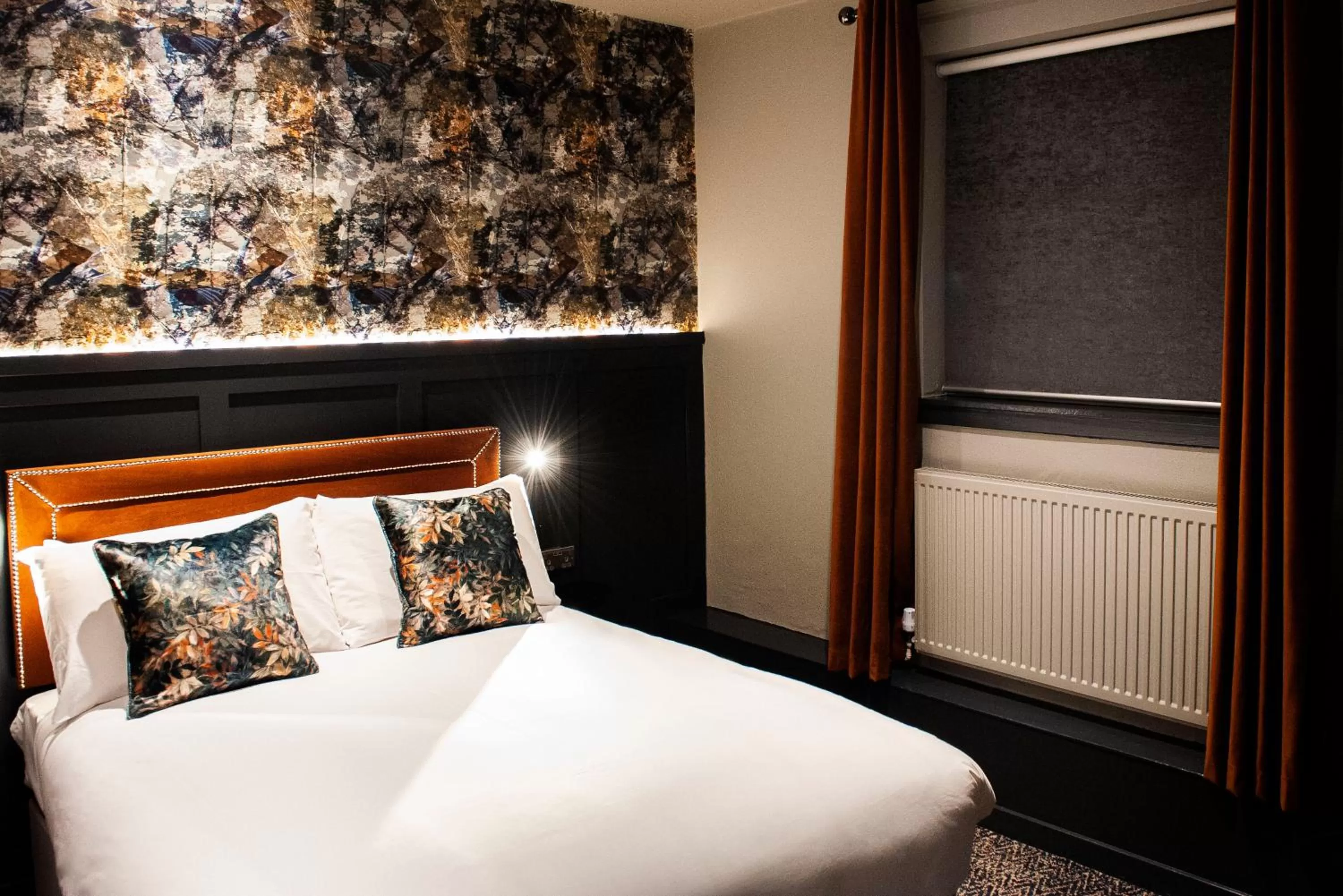 Bed in The Coachman Hotel