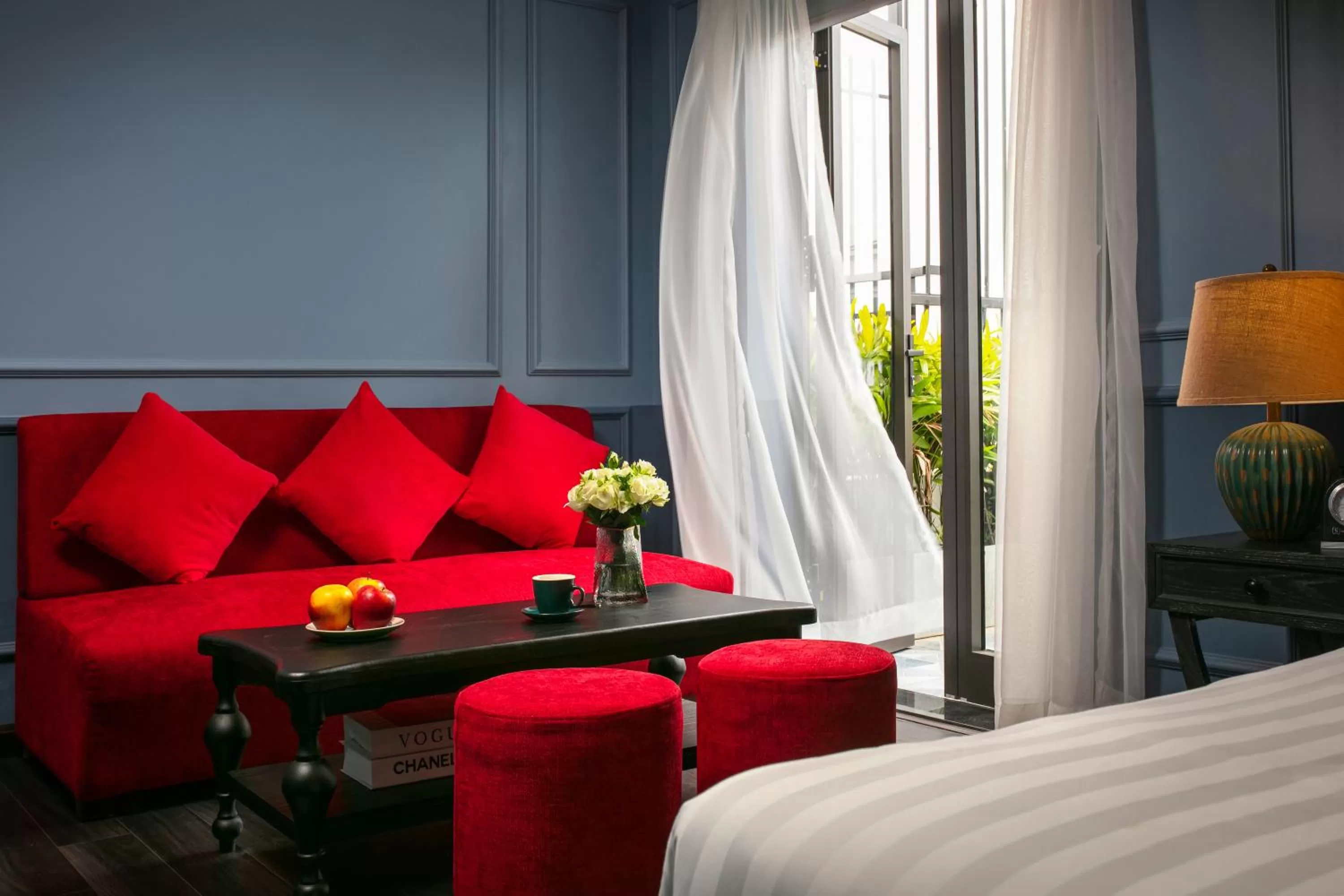 Seating area, Bed in The Secret HaLong