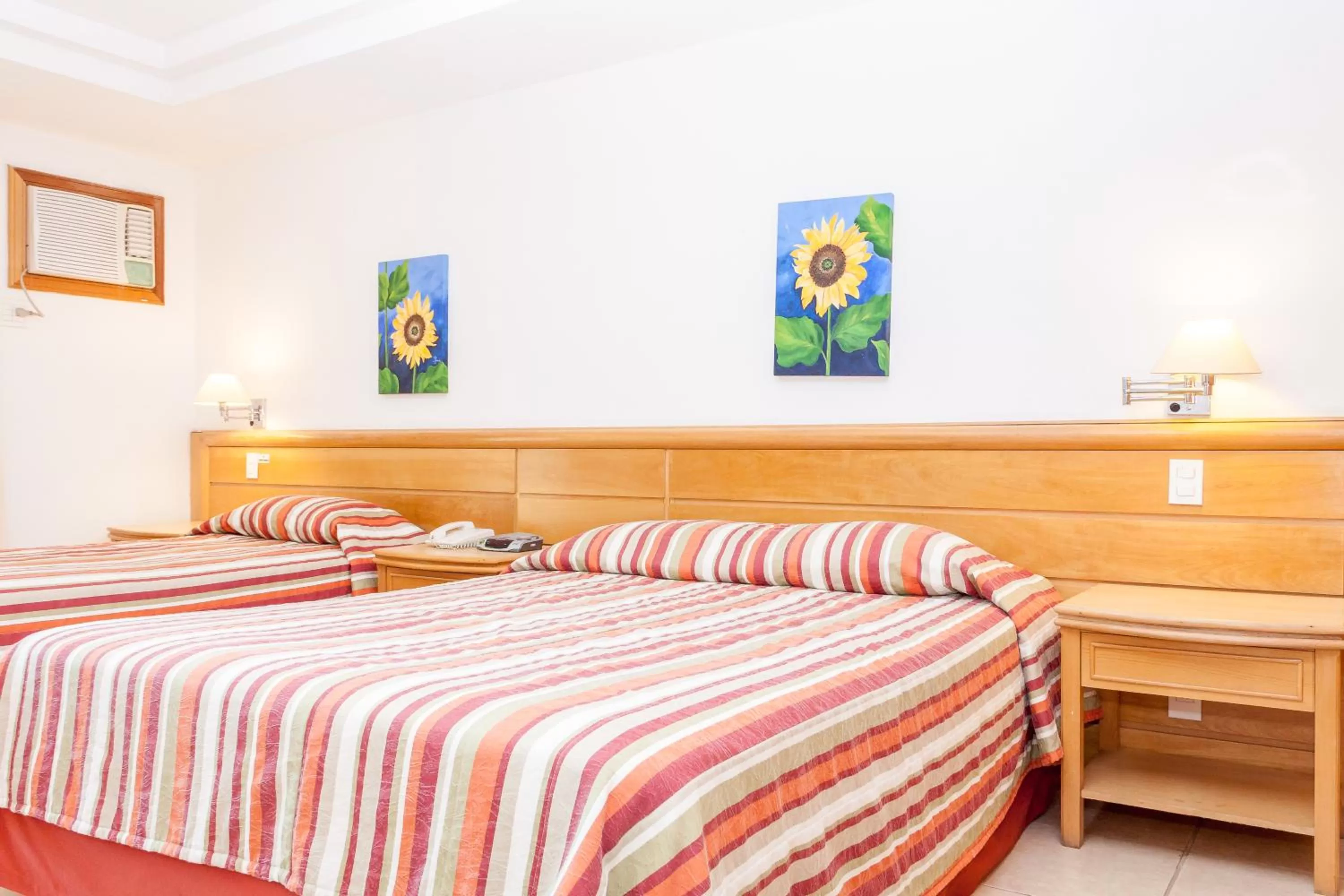 Photo of the whole room, Bed in Hotel Atlântico Búzios Convention