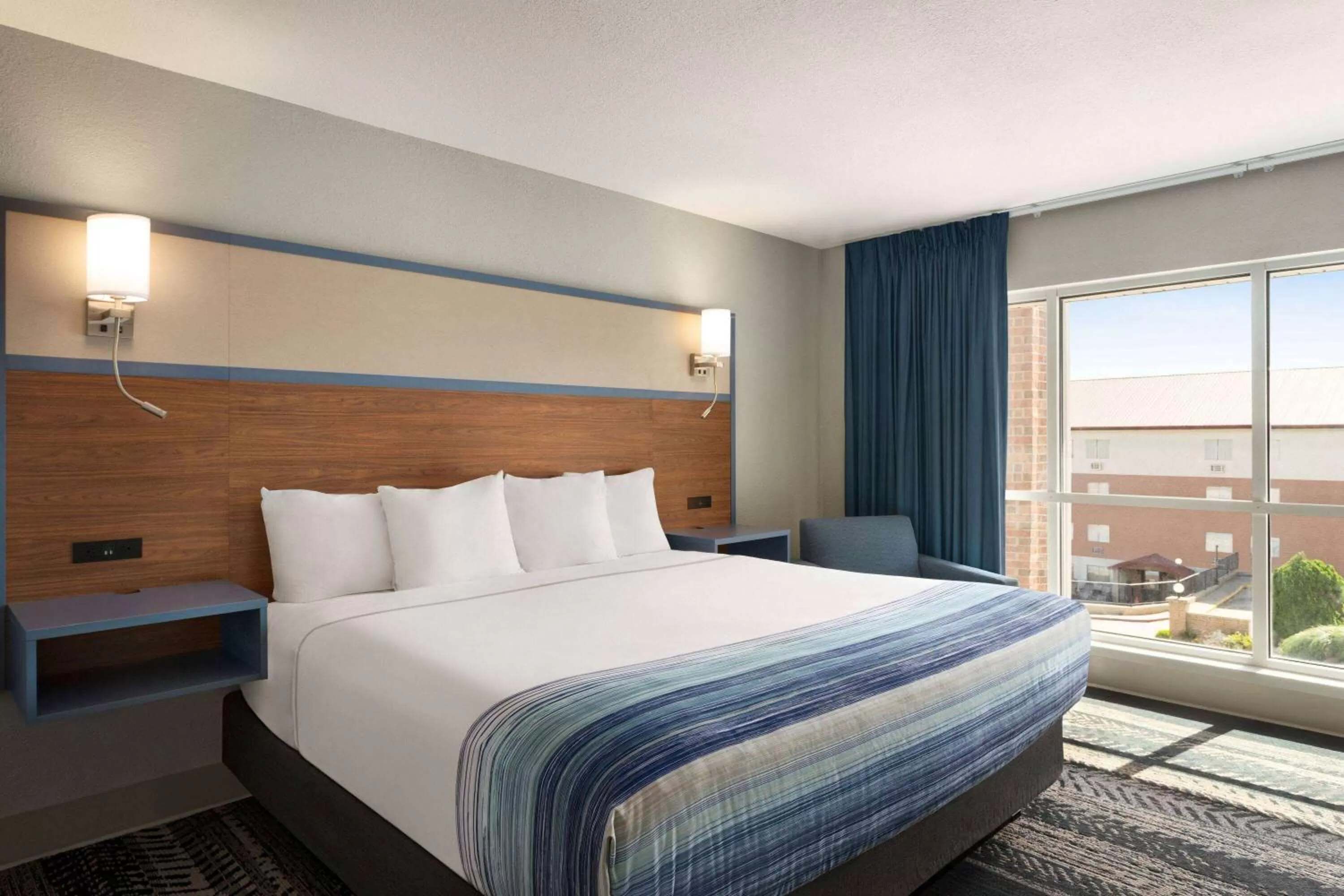 Photo of the whole room, Bed in AmericInn by Wyndham Branson & Conference Center