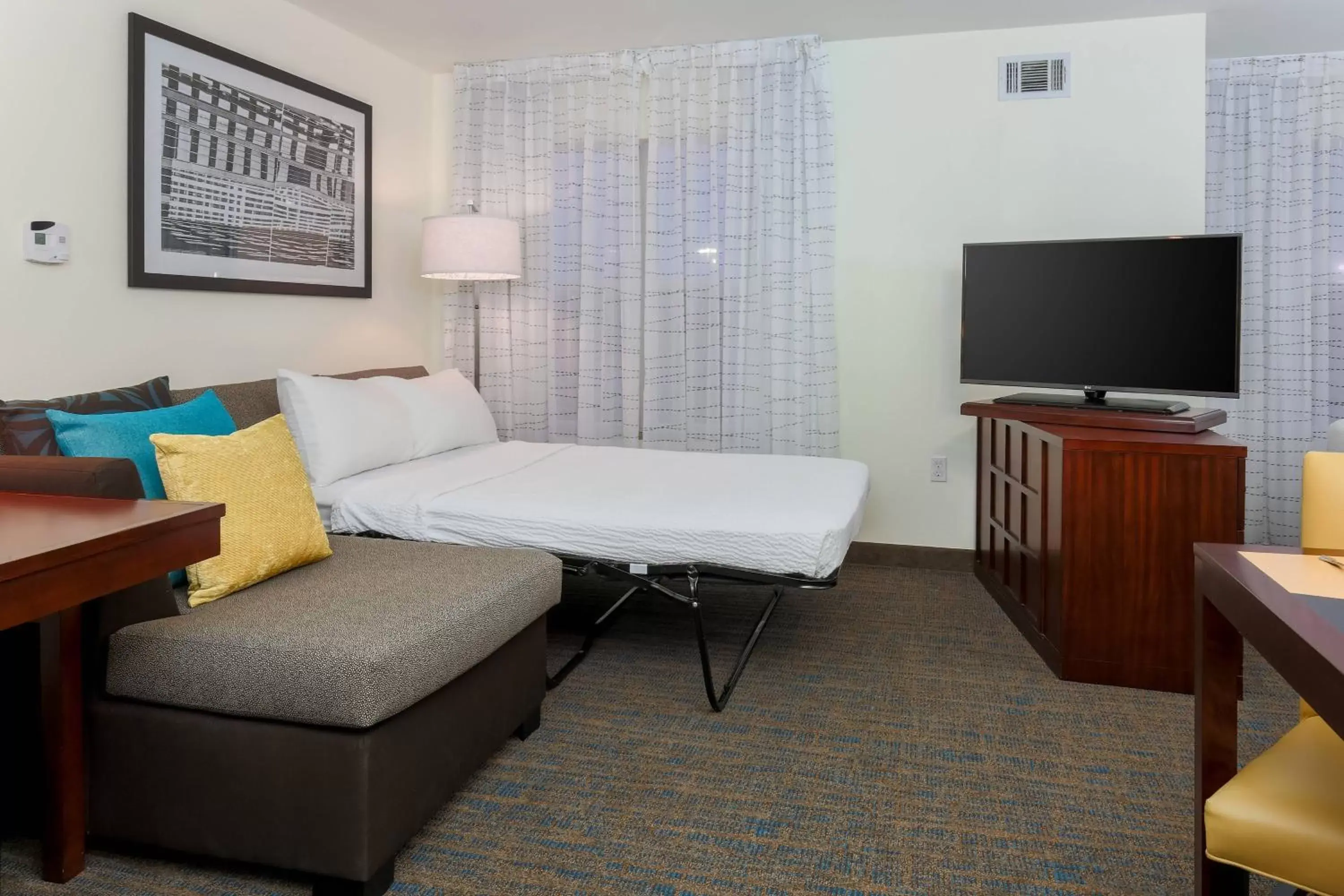 Photo of the whole room, TV/Entertainment Center in Residence Inn by Marriott Arlington South