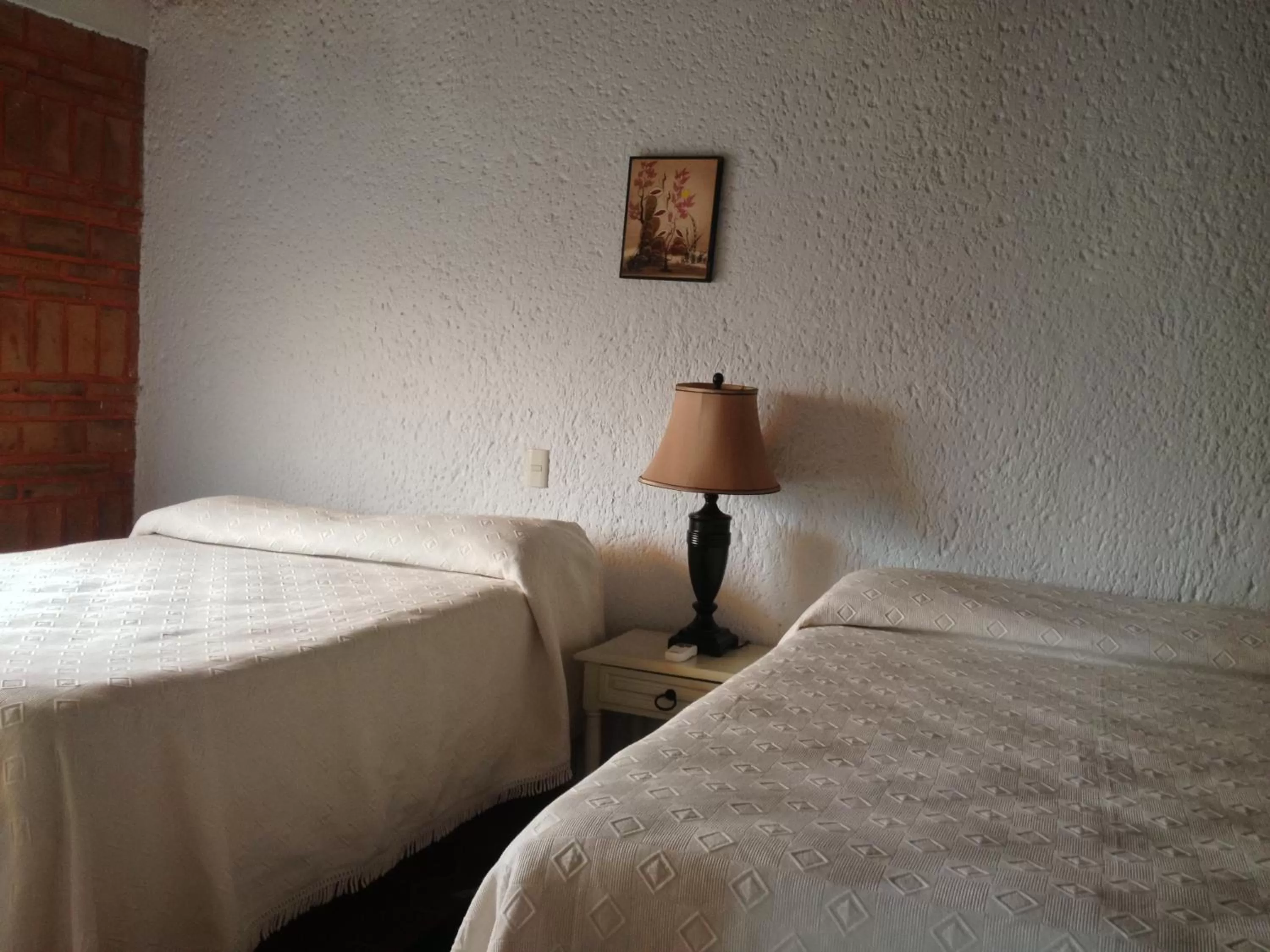 Bed in Mama Chuy Hotel & Villas