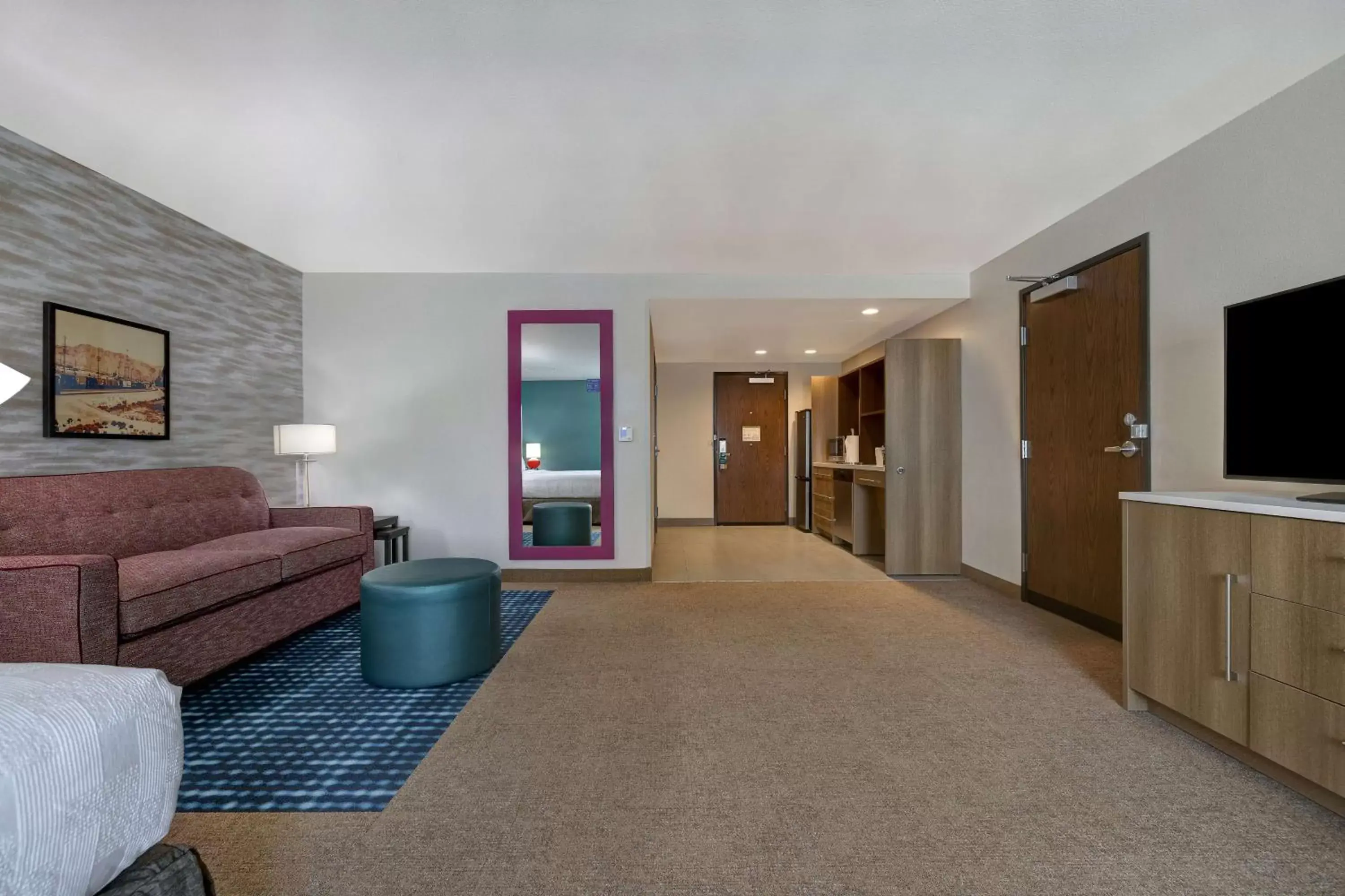 Living room, Seating Area in Home2 Suites By Hilton Barstow, Ca