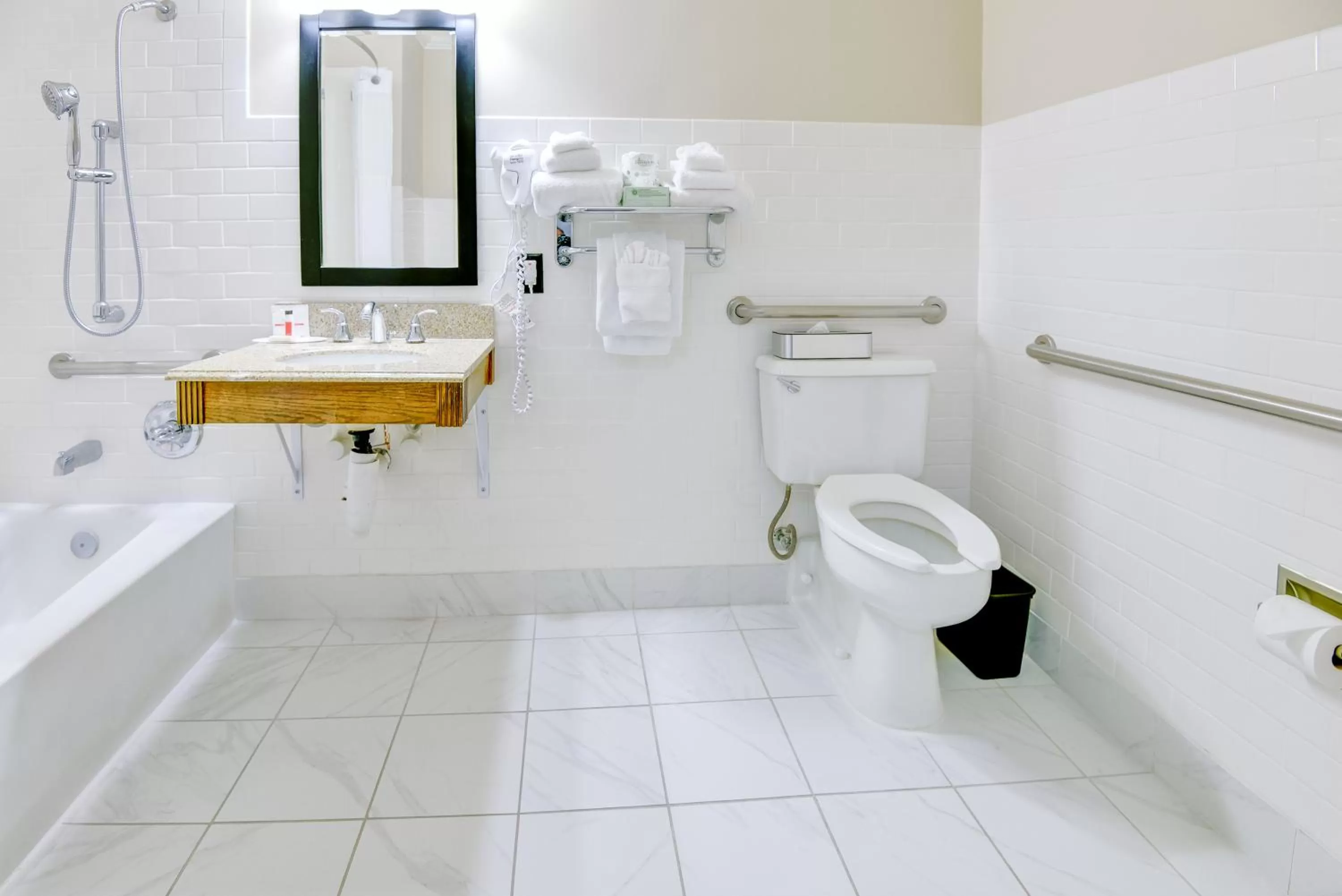 Bathroom in Ramada by Wyndham Metairie New Orleans Airport