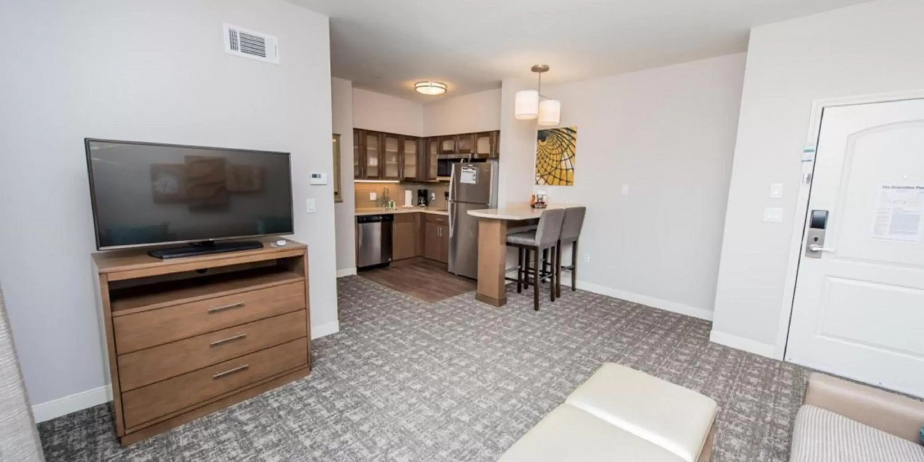 Photo of the whole room, TV/Entertainment Center in Staybridge Suites Houston East - Baytown, an IHG Hotel