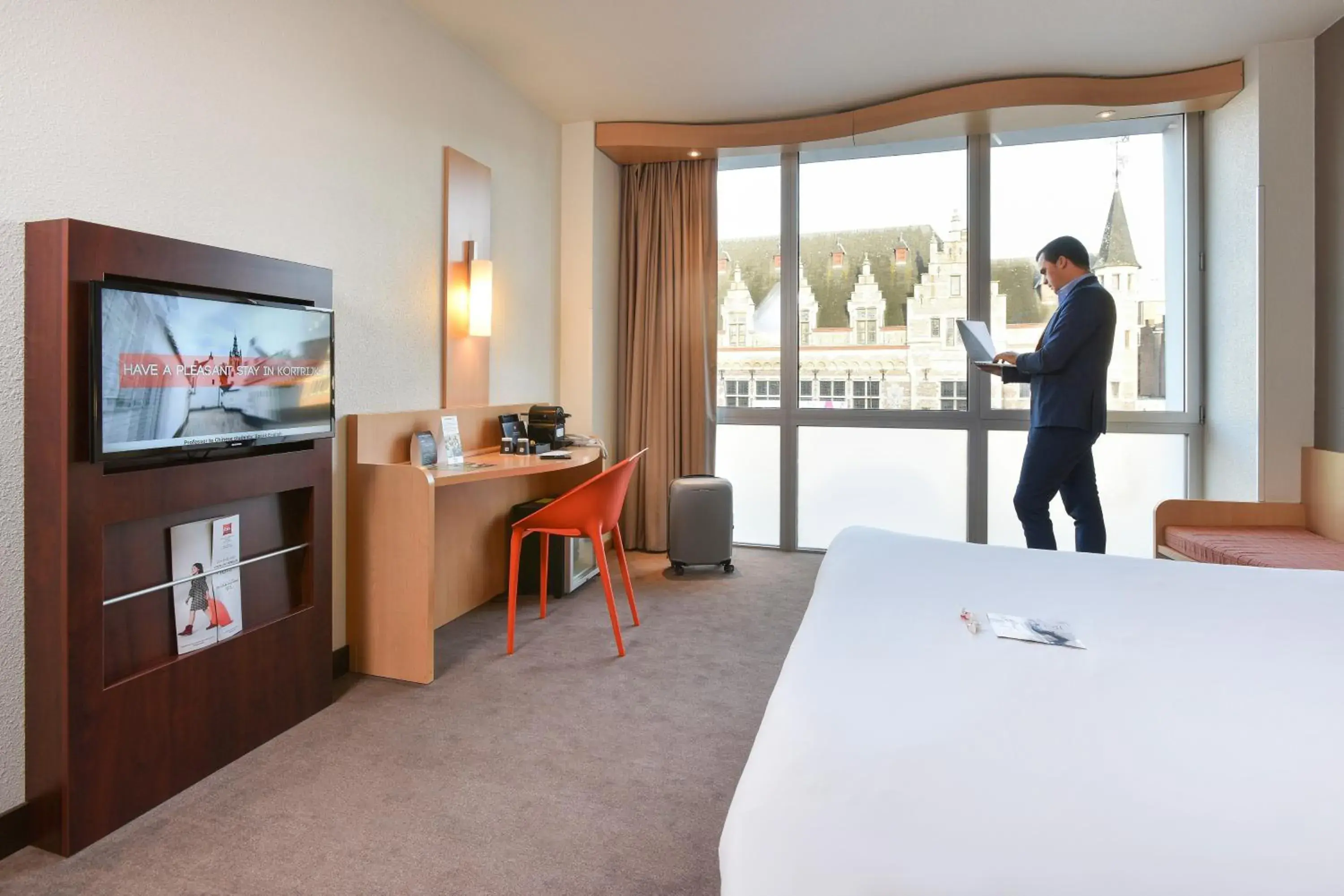 Bed, TV/Entertainment Center in ibis Kortrijk Centrum