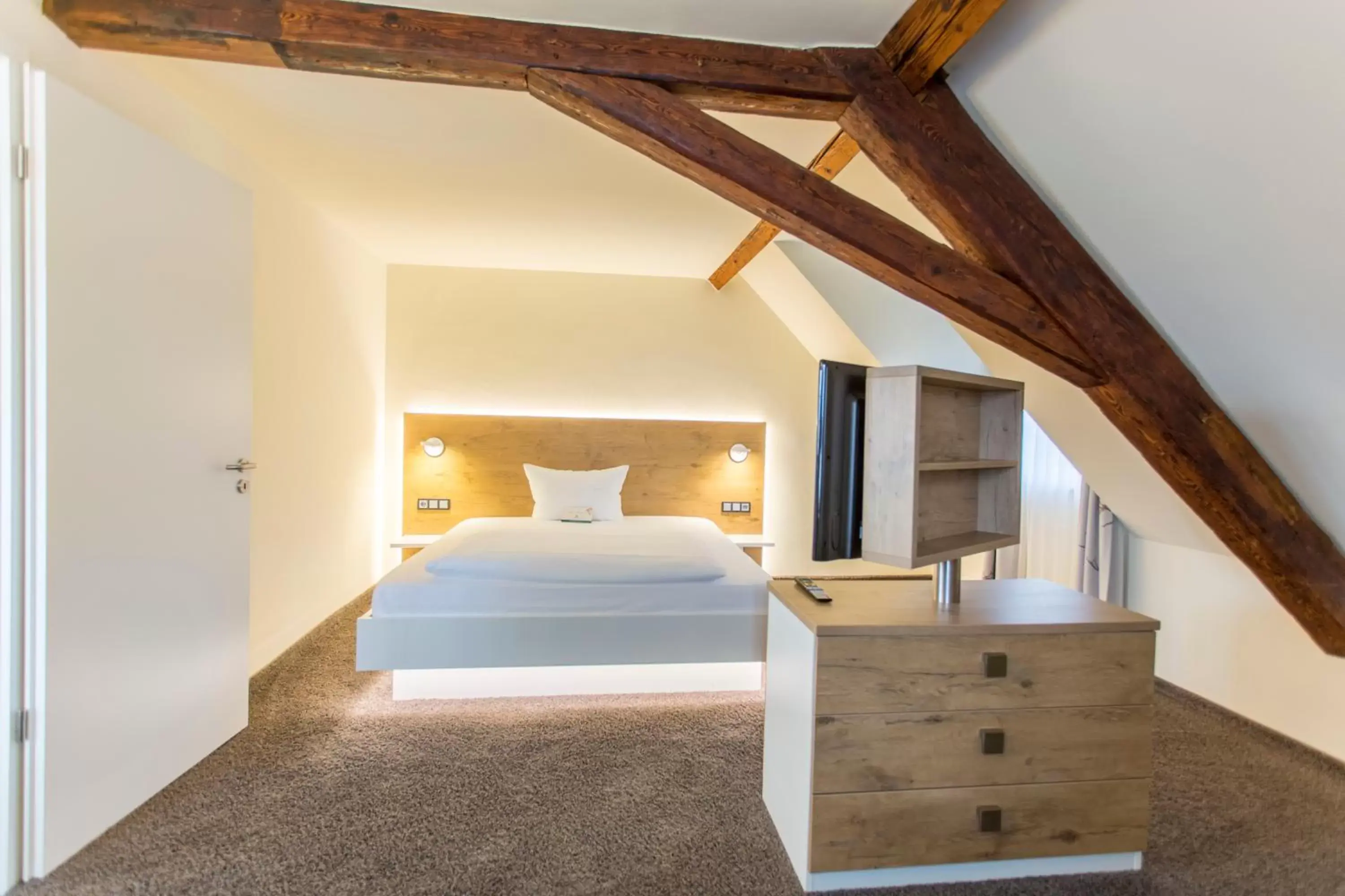 Bed in Hotel Jägerhaus in Esslingen Bed in Hotel Jägerhaus in Esslingen