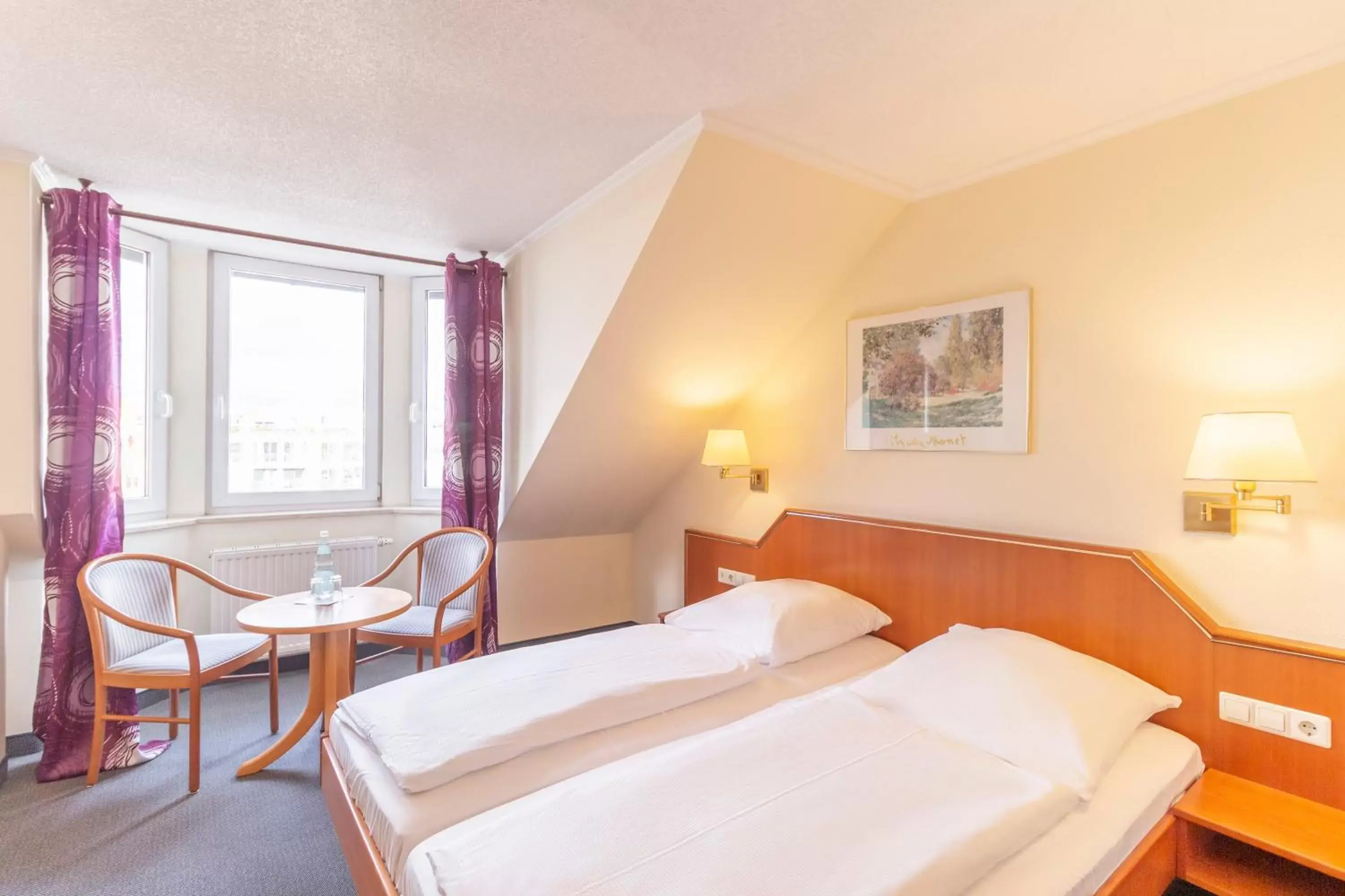 Seating area, Bed in Hotel Markgraf Leipzig Seating area, Bed in Hotel Markgraf Leipzig