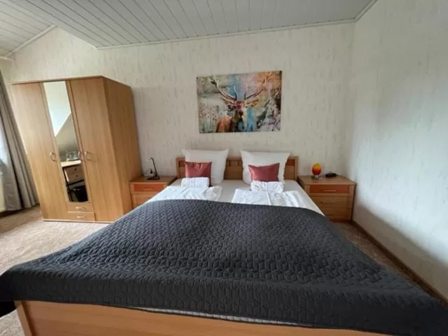 Bed in Hotel Rehkitz