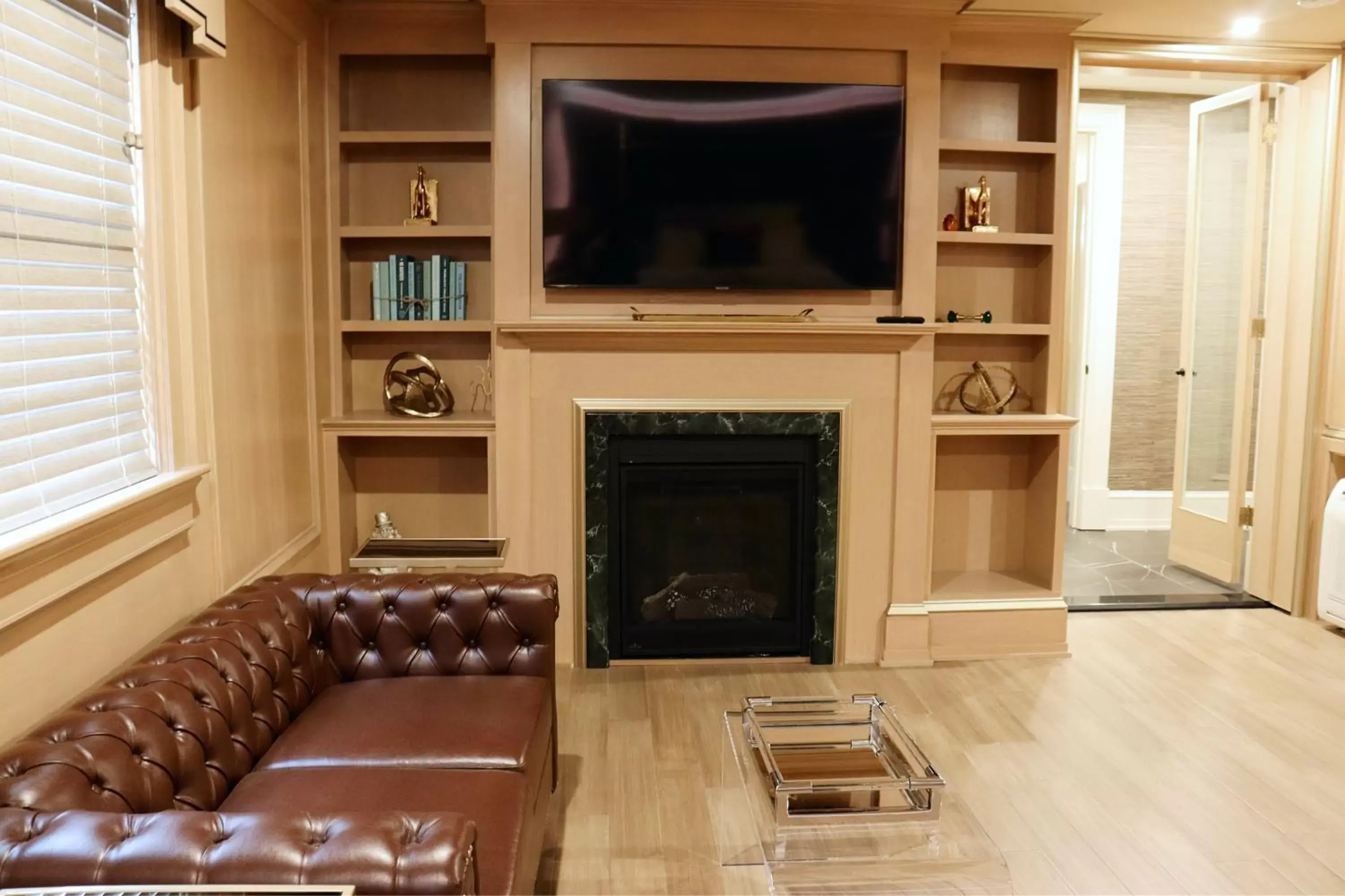 Living room, TV/Entertainment Center in The Edward Buffalo