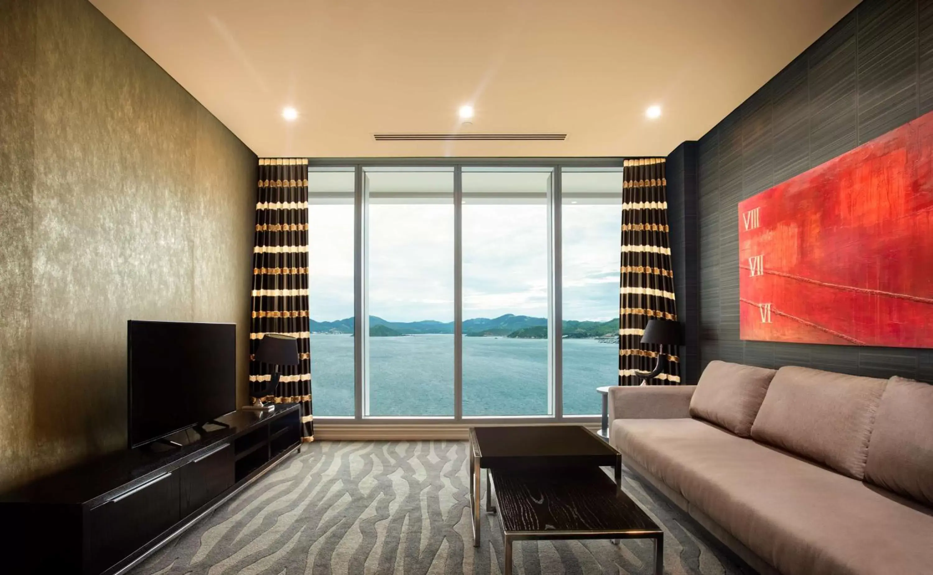 Living room, Seating Area in Grand Papua Hotel, a member of Radisson Individuals