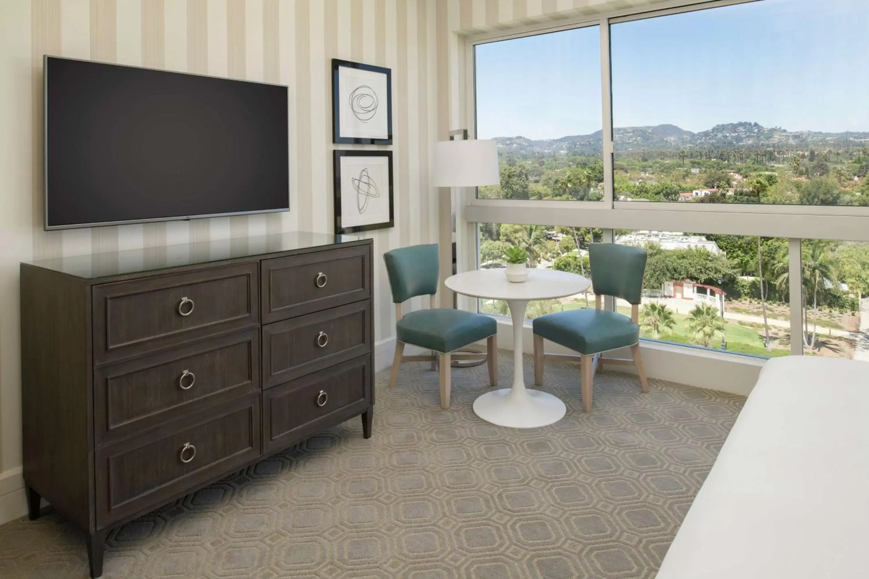 Bedroom, TV/Entertainment Center in The Beverly Hilton