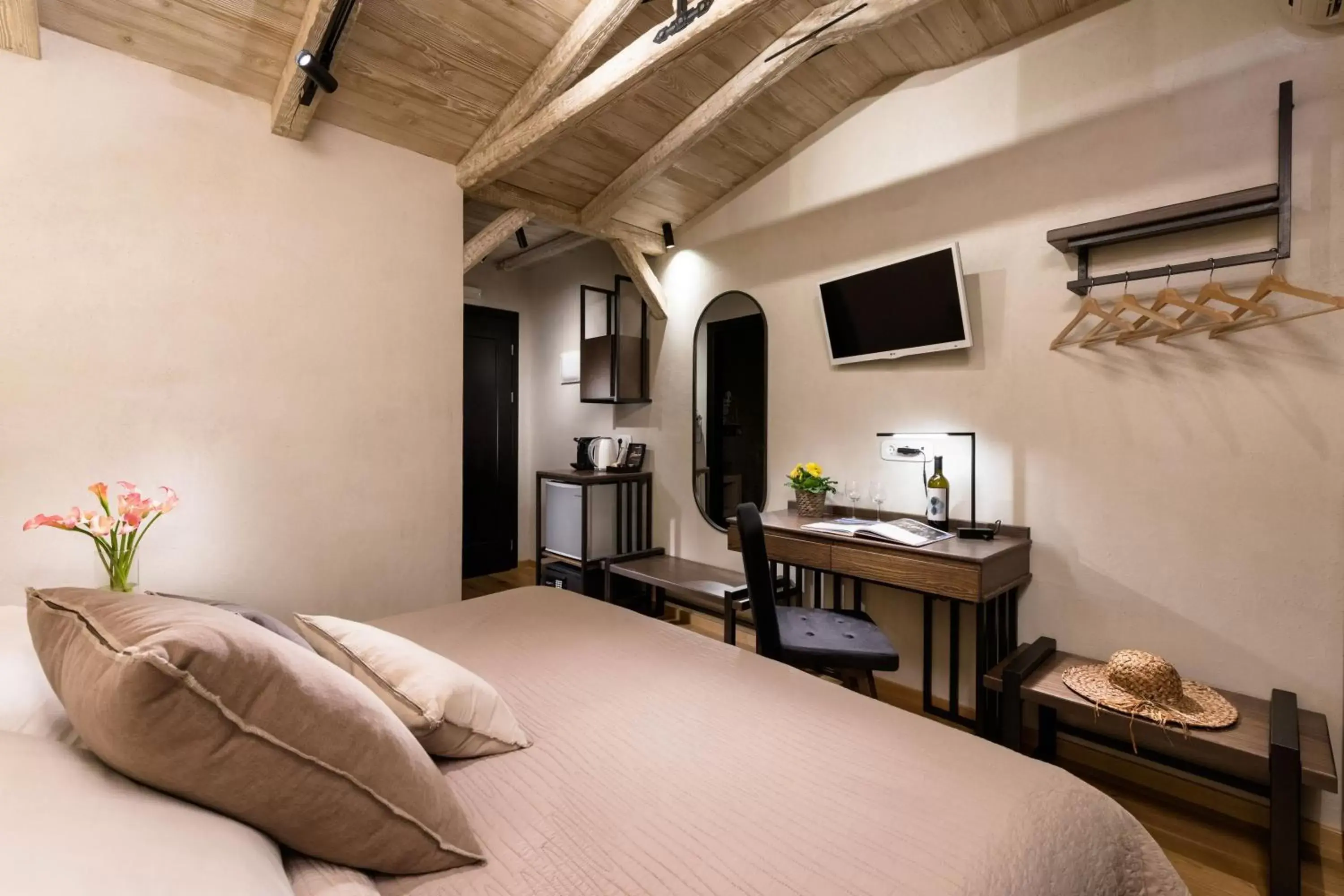 Bed in Tsikeli Boutique Hotel Meteora - Adults Friendly