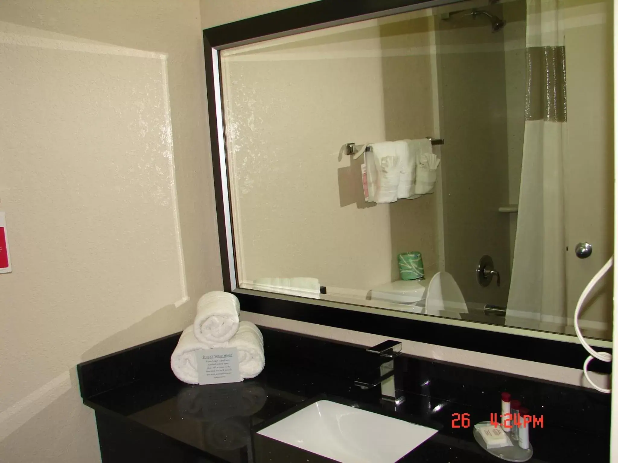 Bathroom in Ramada Plaza by Wyndham Charlotte South End Airport Bathroom in Ramada Plaza by Wyndham Charlotte South End Airport
