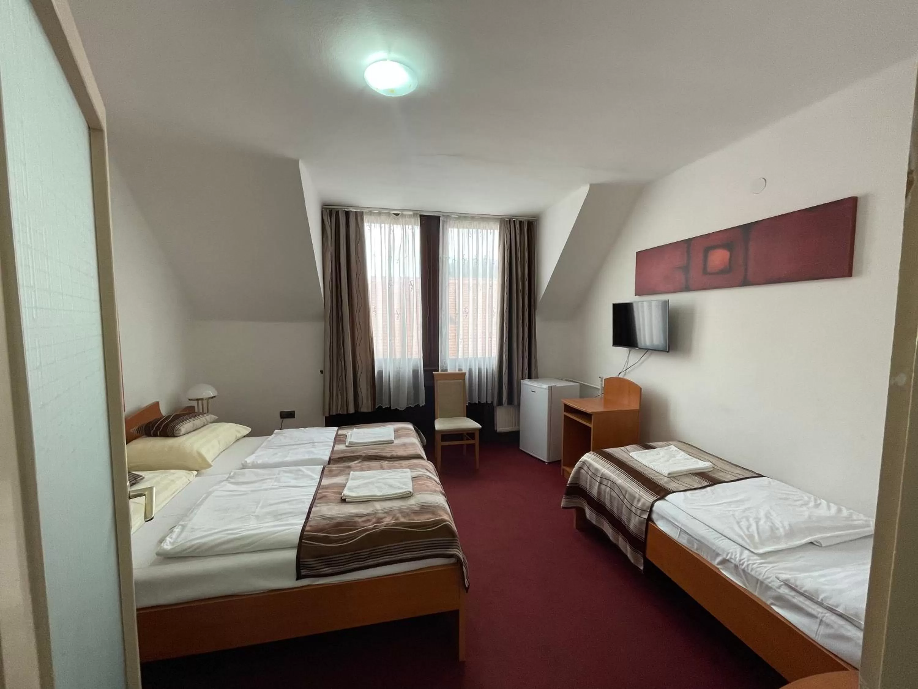 Bed in Hotel Minaret&Étterem