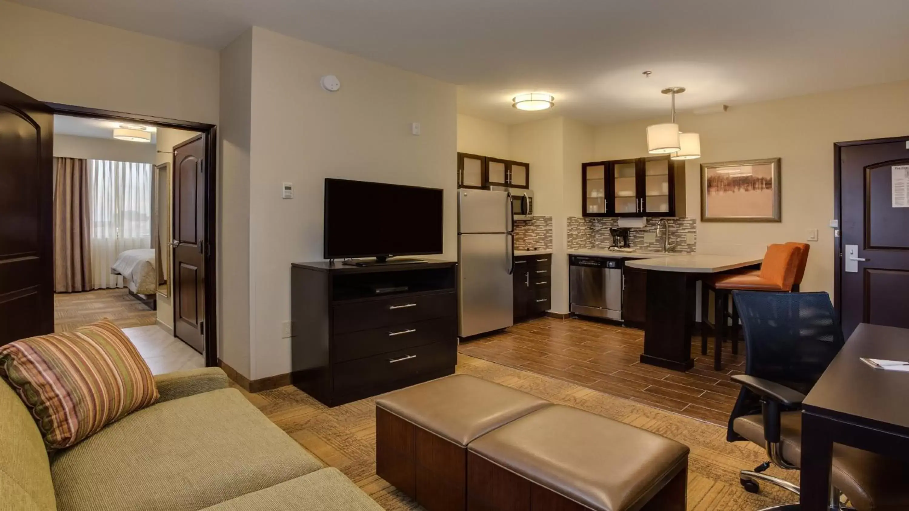 Bedroom, Seating Area in Staybridge Suites - Johnson City, an IHG Hotel