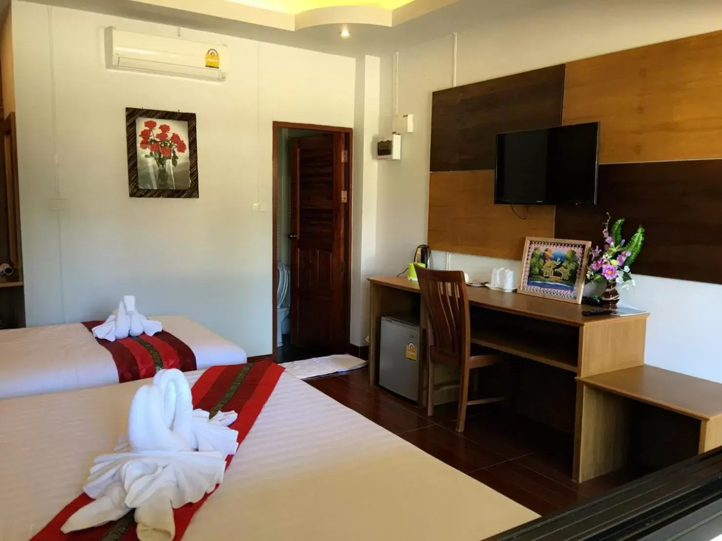 Bed in Hugpua Hotel