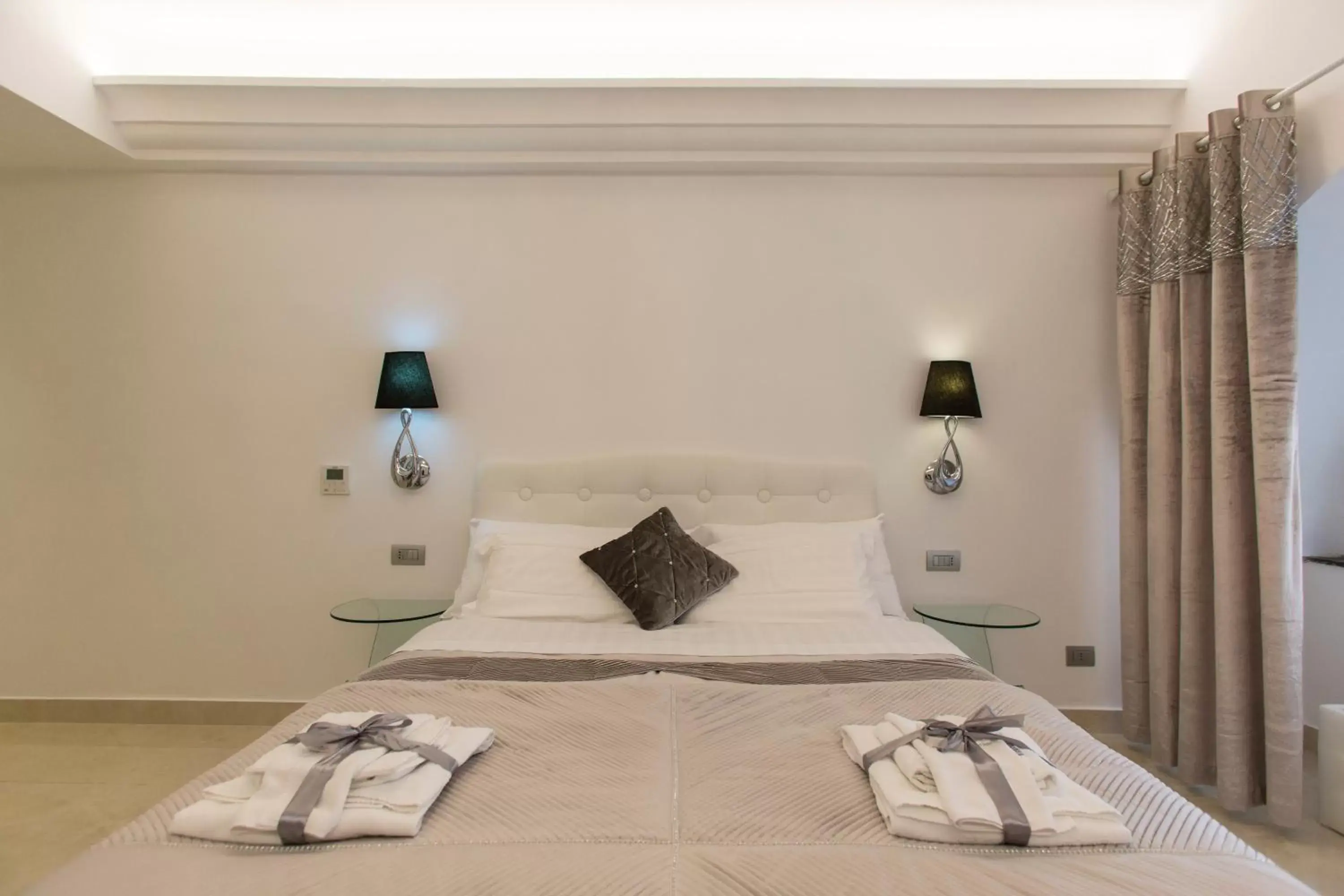 Bed in San Pietro Grand Suite
