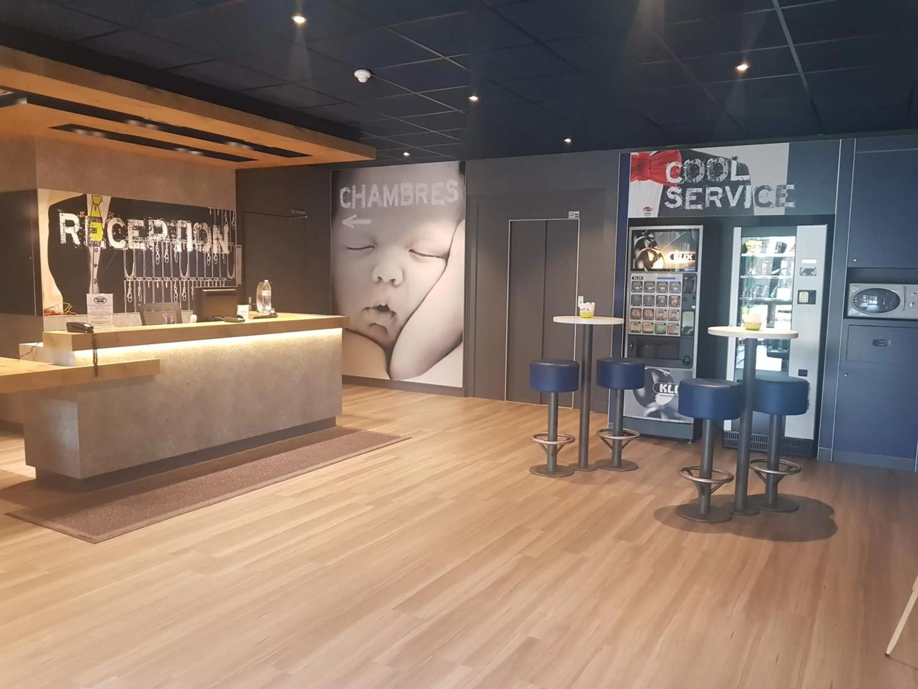 Lobby or reception in ibis budget Lorient Hennebont