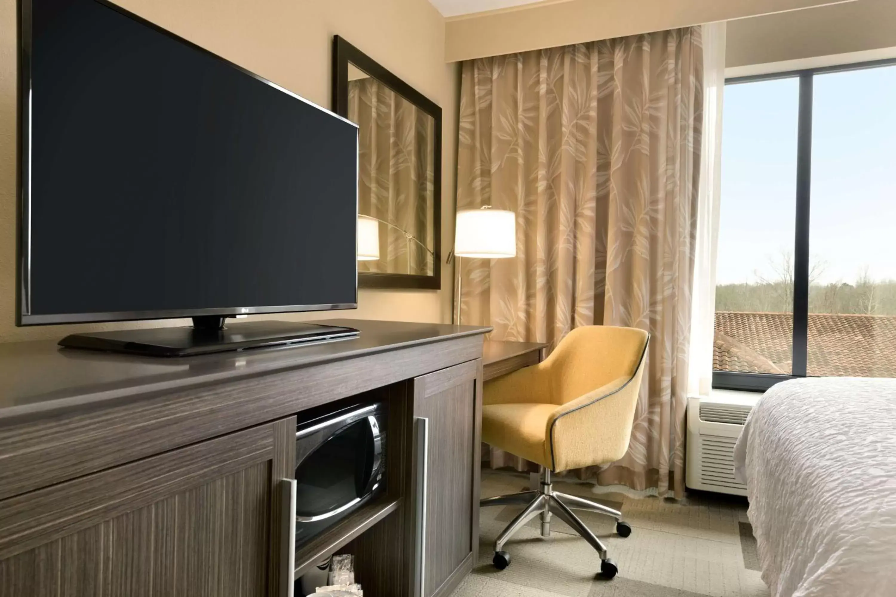 Bed, TV/Entertainment Center in Hampton Inn and Suites Monroe