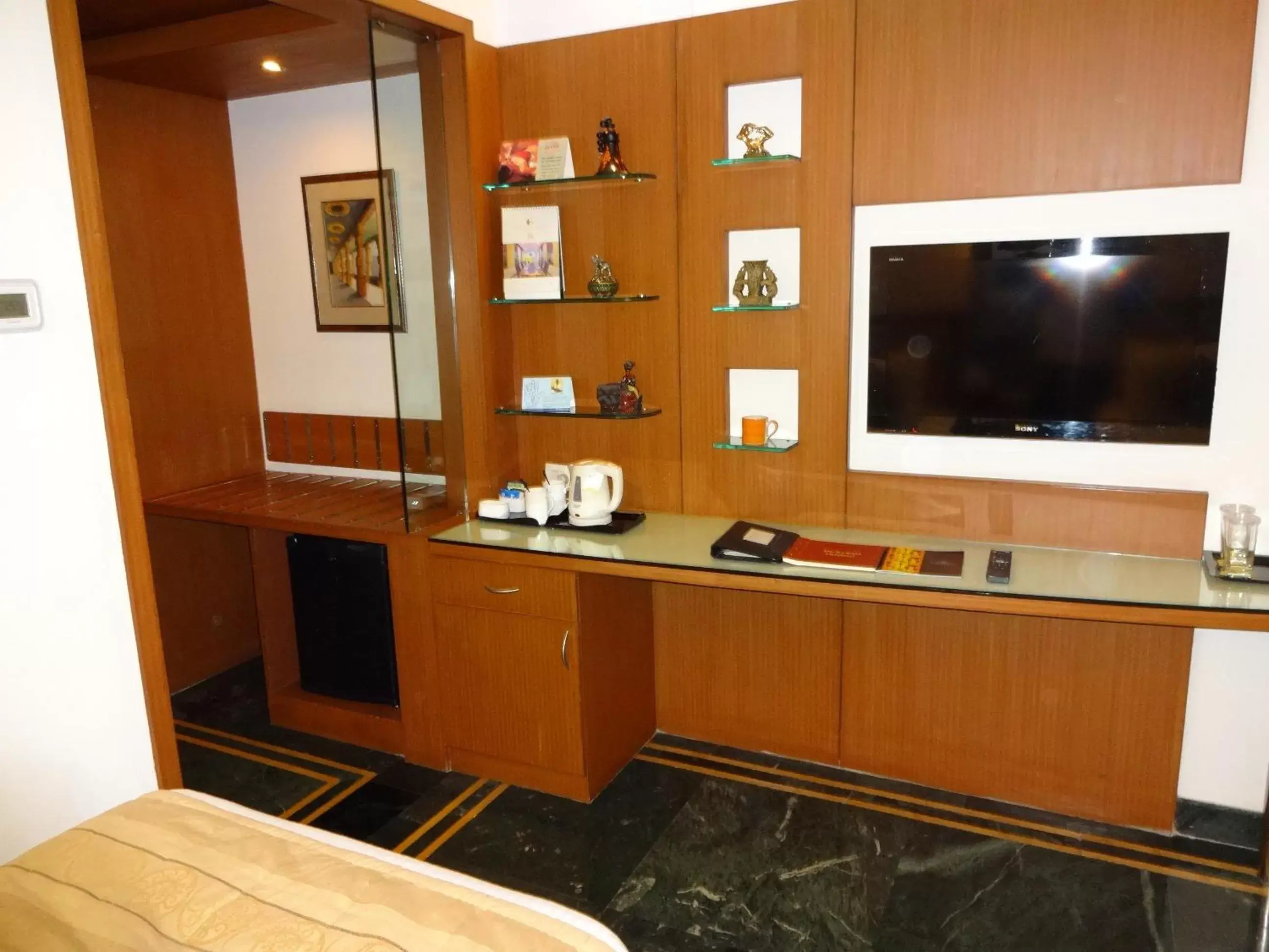 TV and multimedia, TV/Entertainment Center in Regency Madurai by GRT Hotels