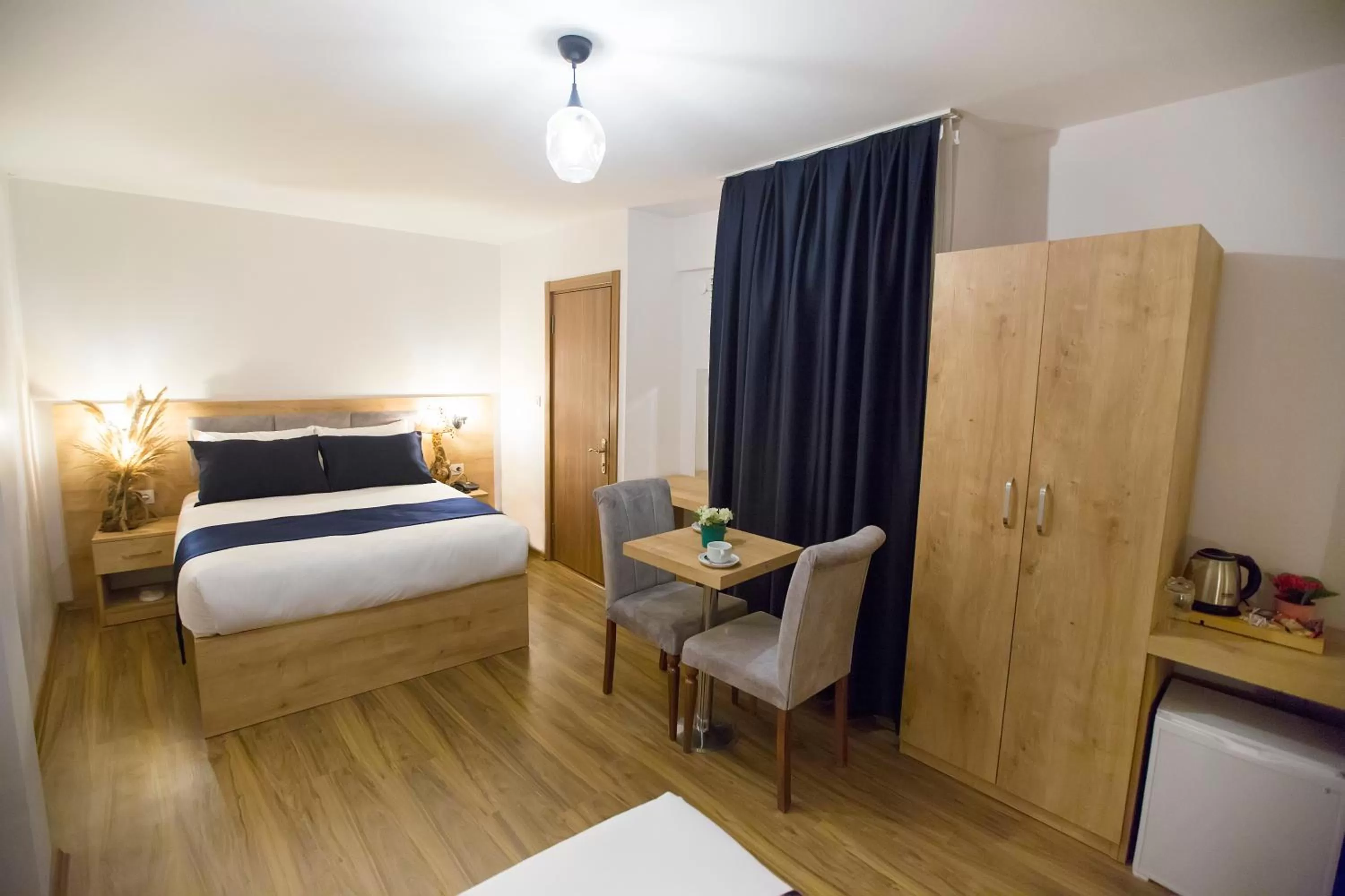 Dining area, Bed in Golden Street Hotel