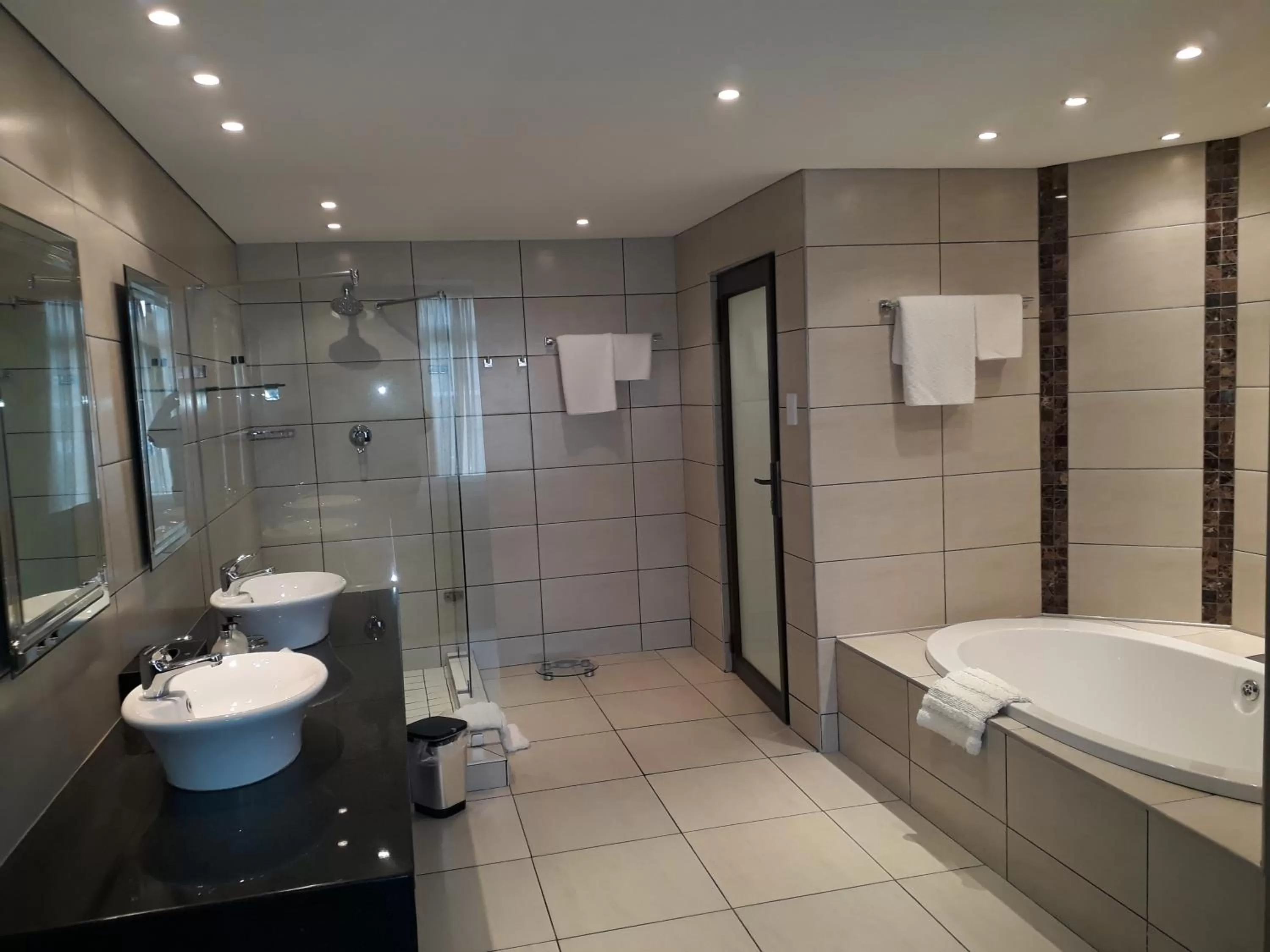 Bathroom in African Sky Hotels - Pine Lake Inn