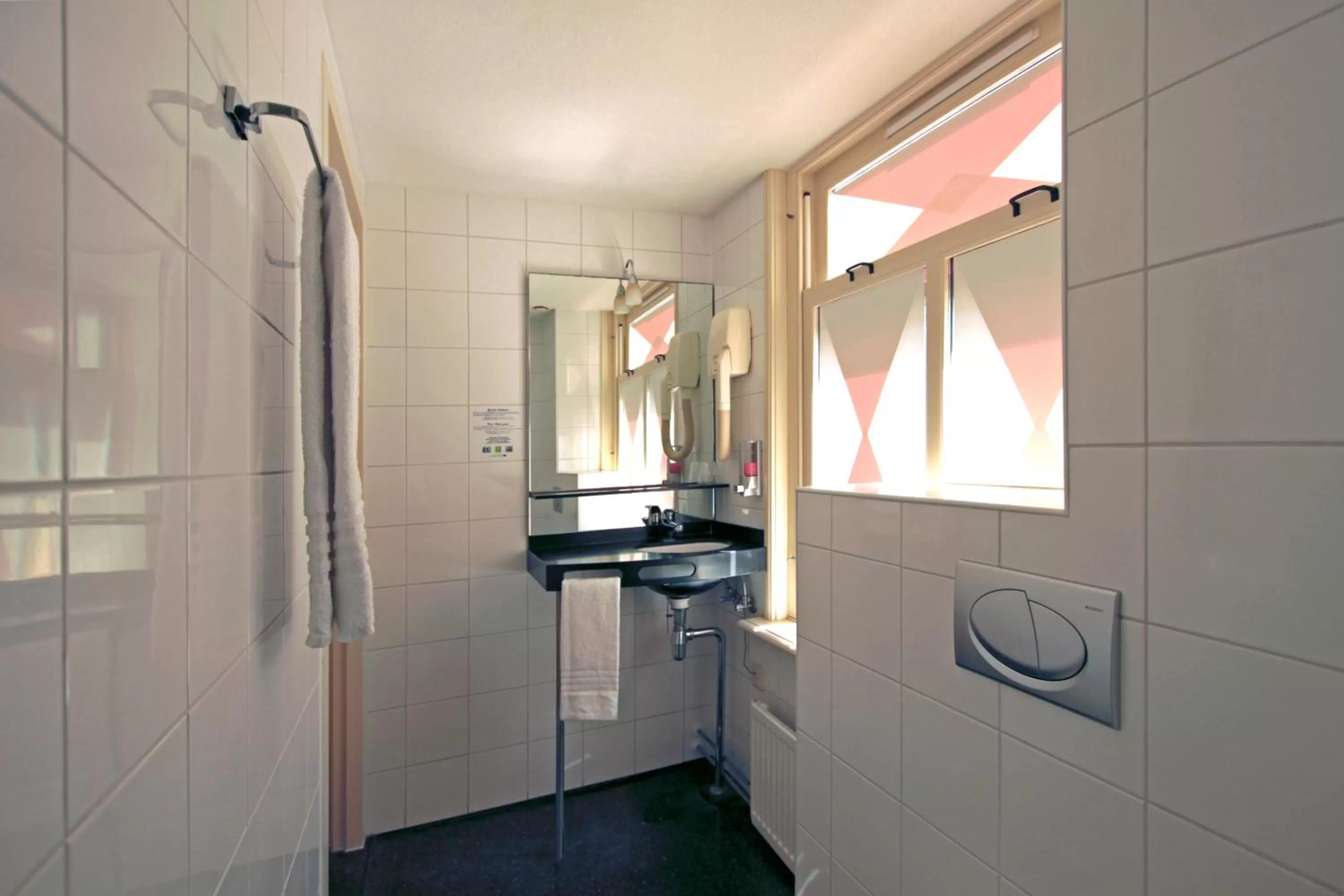 Bathroom in A-Train Hotel