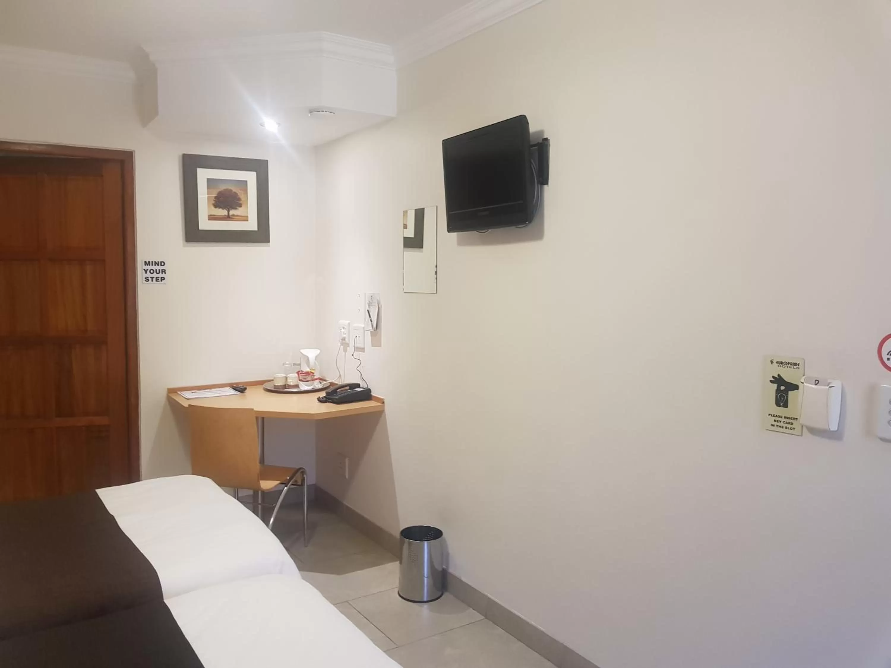 Communal lounge/ TV room in Europrime Hotel