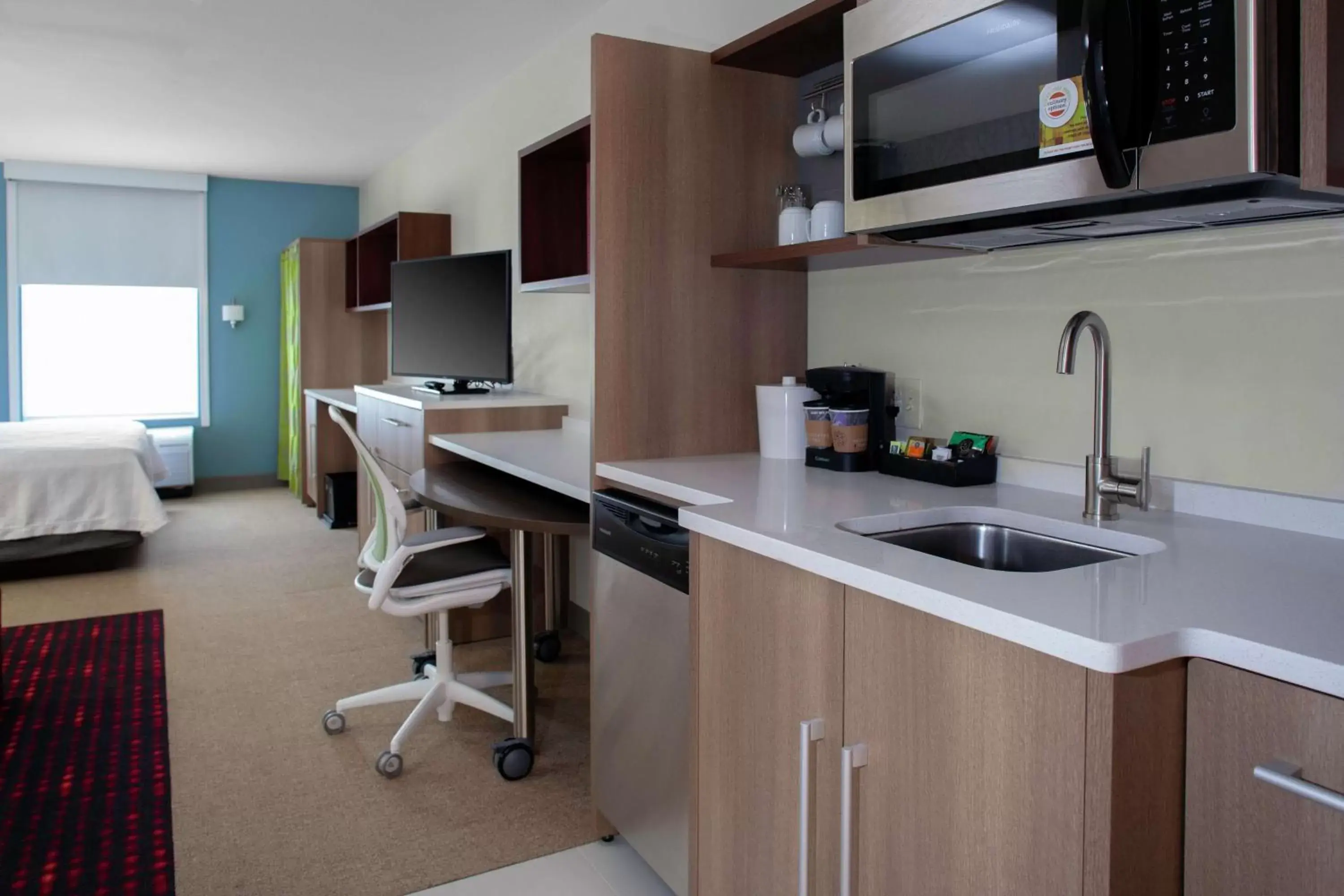 Bedroom, Kitchen/Kitchenette in Home2 Suites By Hilton Denver South Centennial Airport