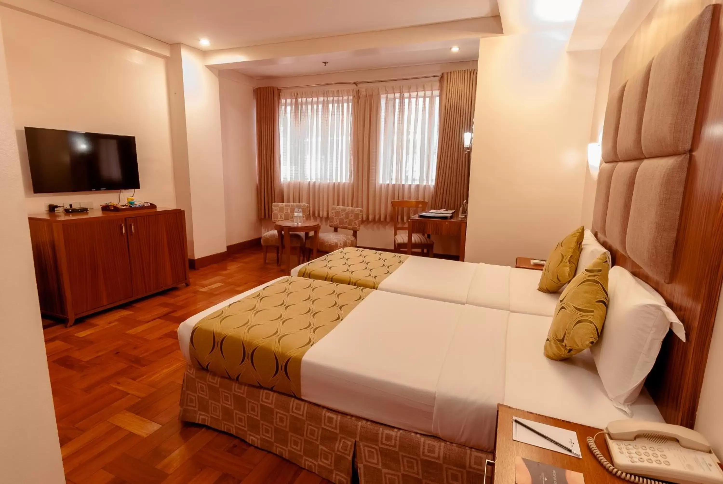 Communal lounge/ TV room, Bed in City Garden Suites