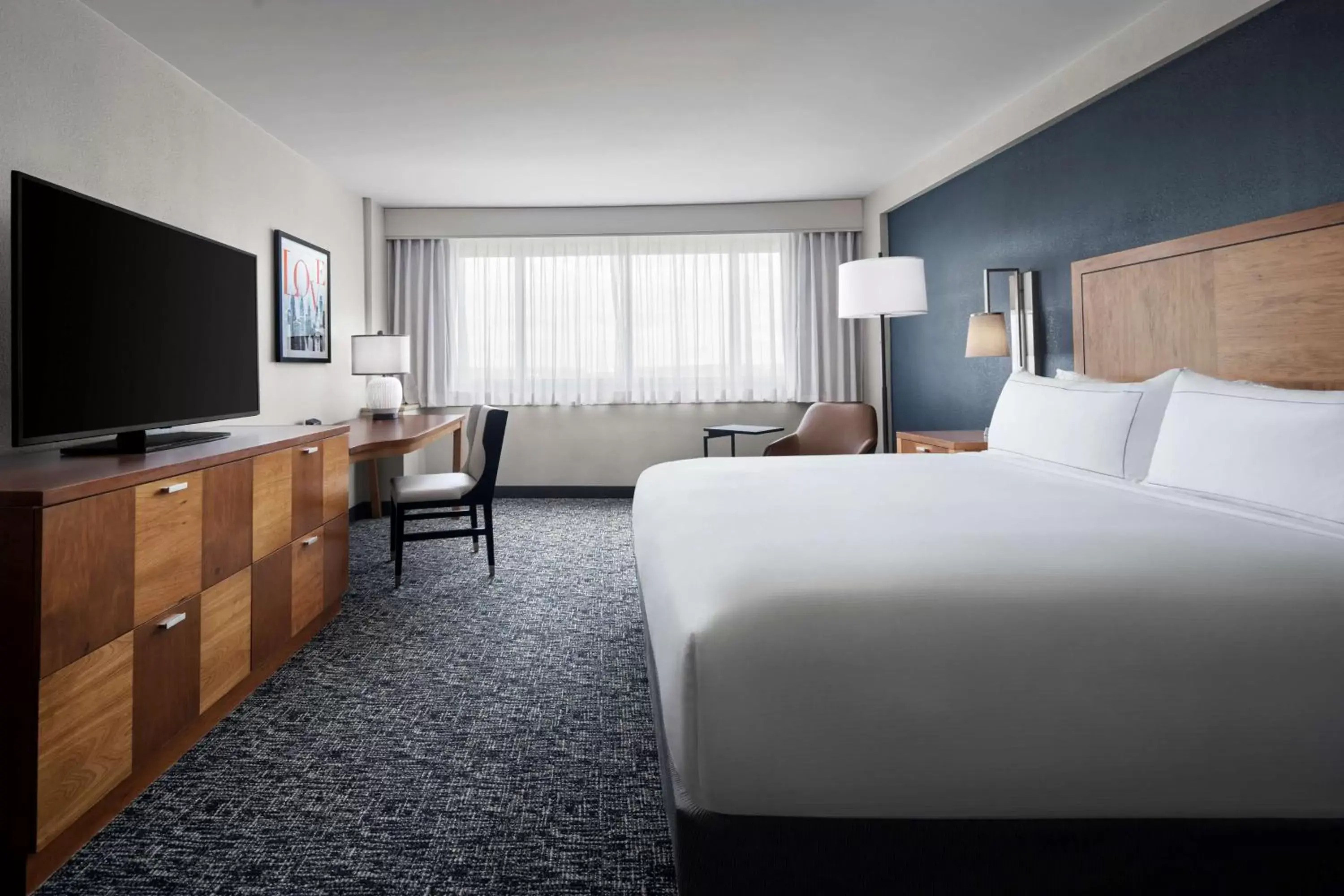 Bed, TV/Entertainment Center in The Alloy, a DoubleTree by Hilton - Valley Forge