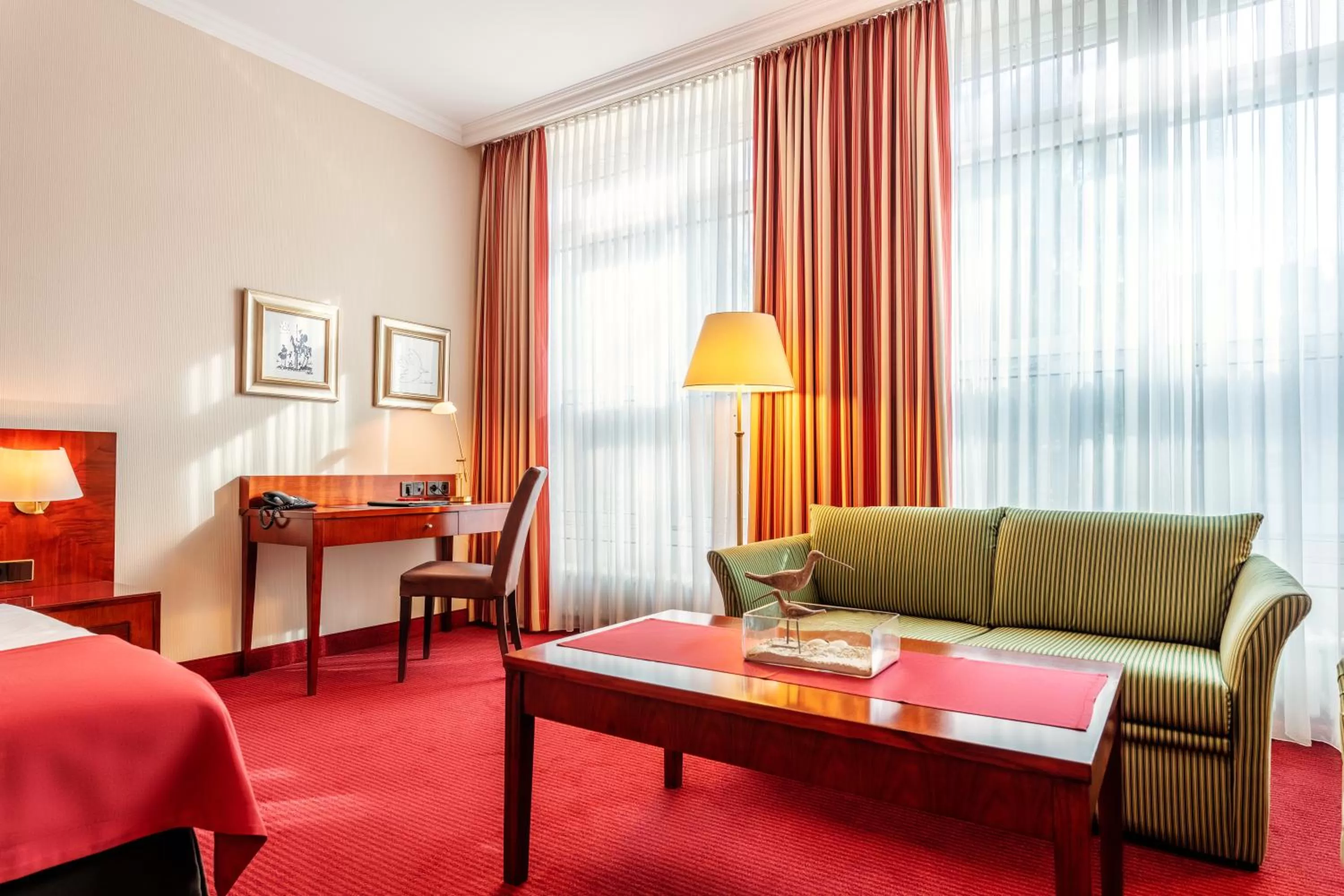 Seating area, Bed in Hotel Amaris Bremerhaven