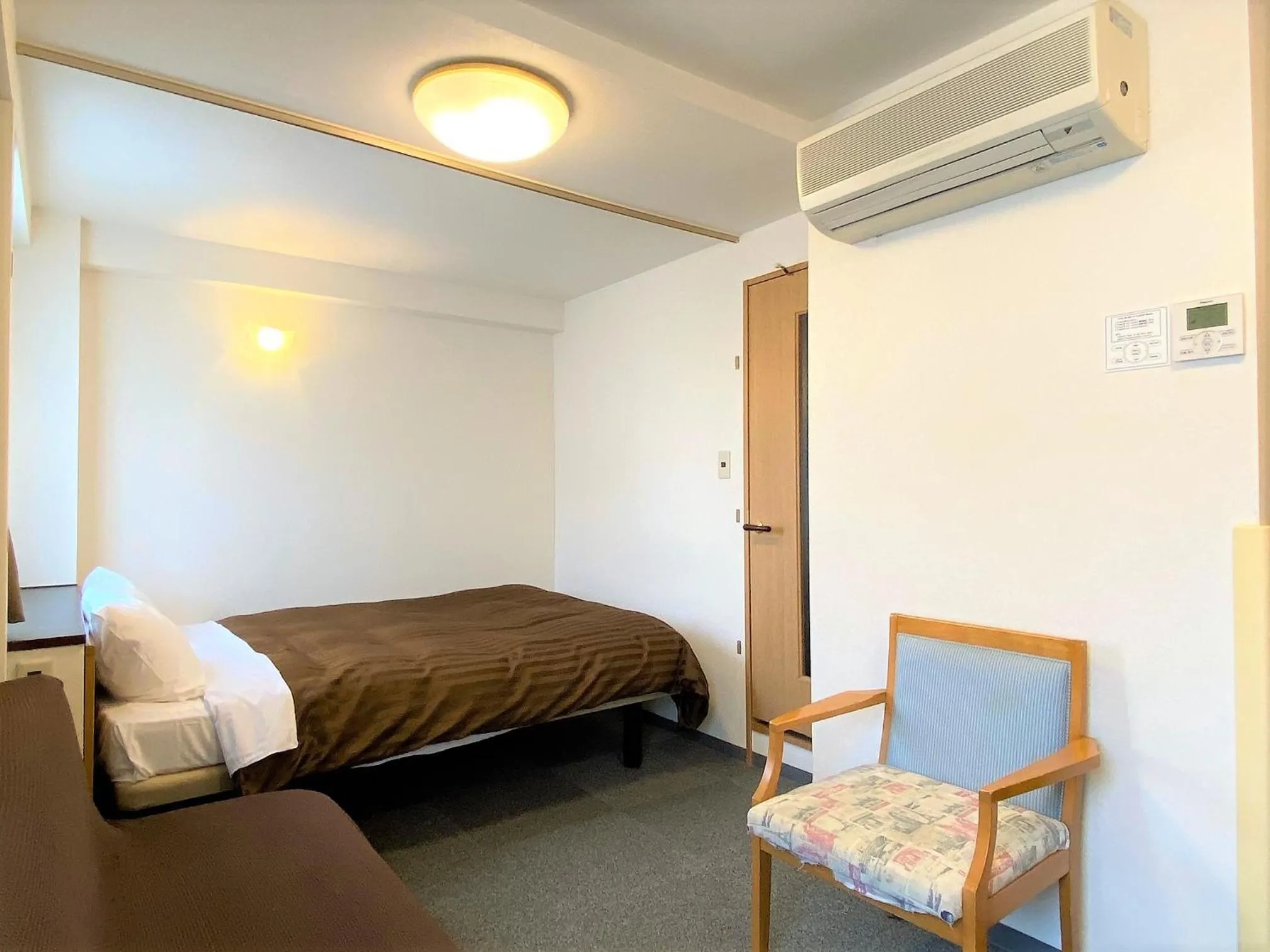 Bed in Sakura Hotel Hatagaya