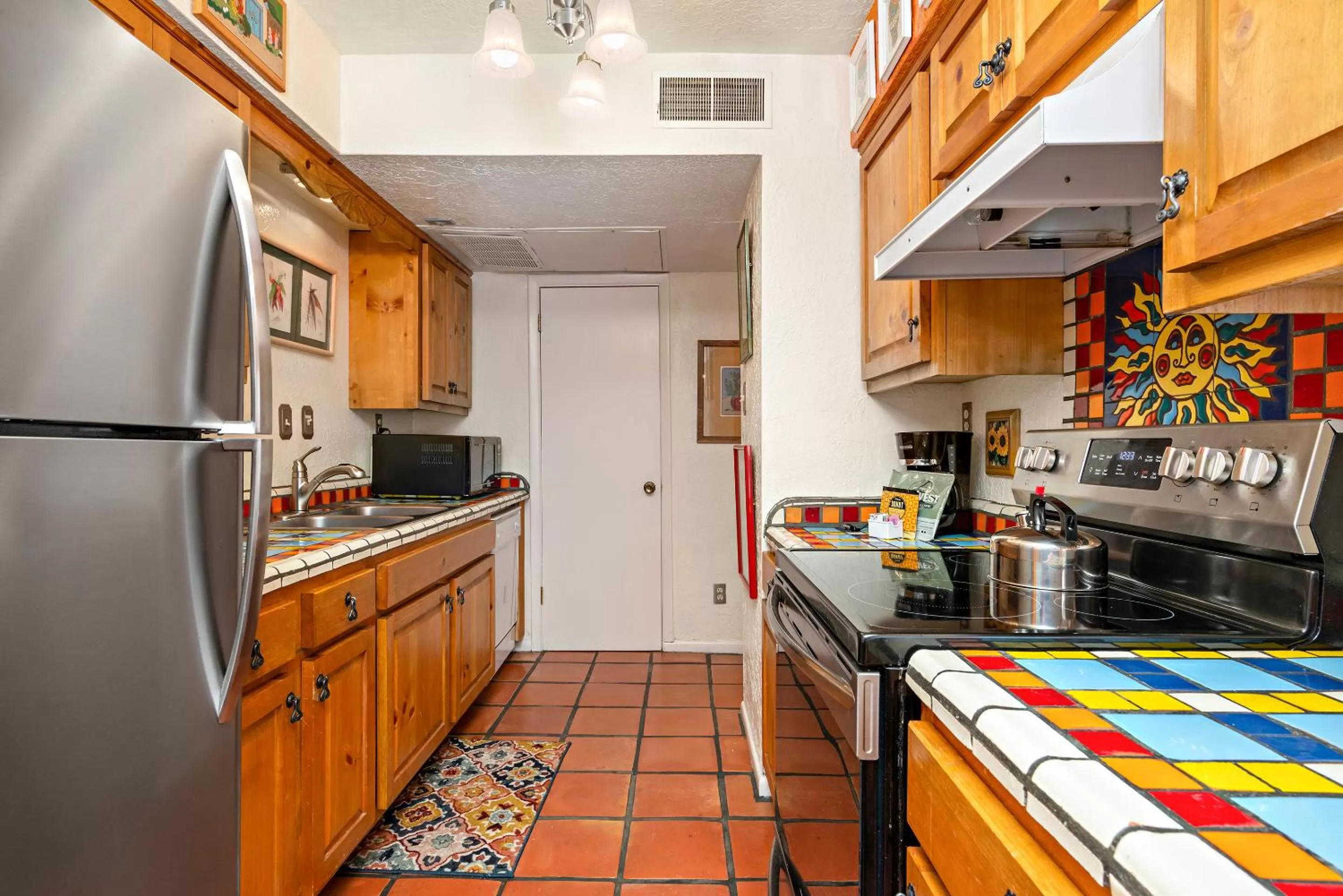 Kitchen or kitchenette in Fort Marcy Suites by All Seasons Resort Lodging