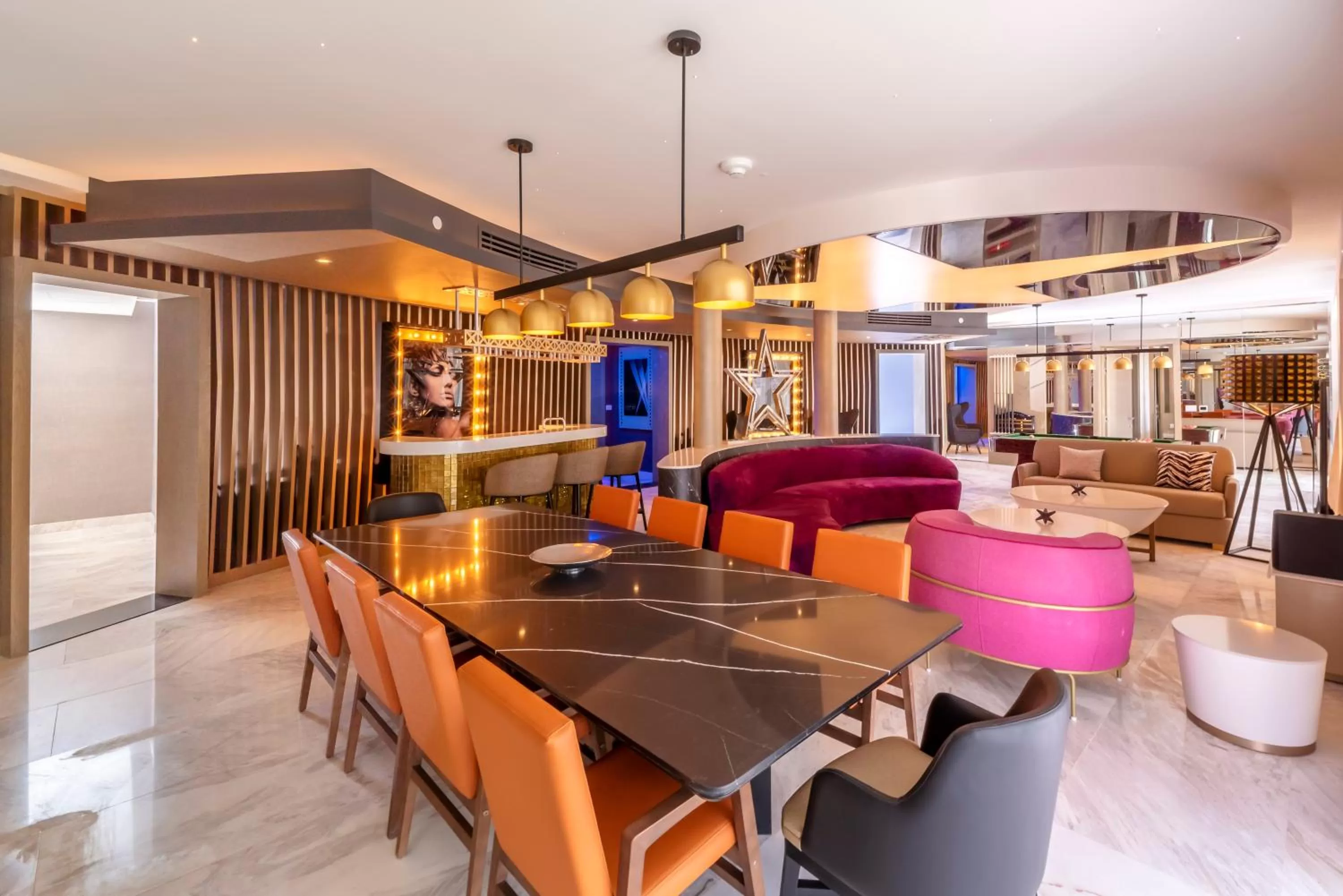 Living room in Planet Hollywood Cancun by Royalton, An Autograph Collection All-Inclusive Resort