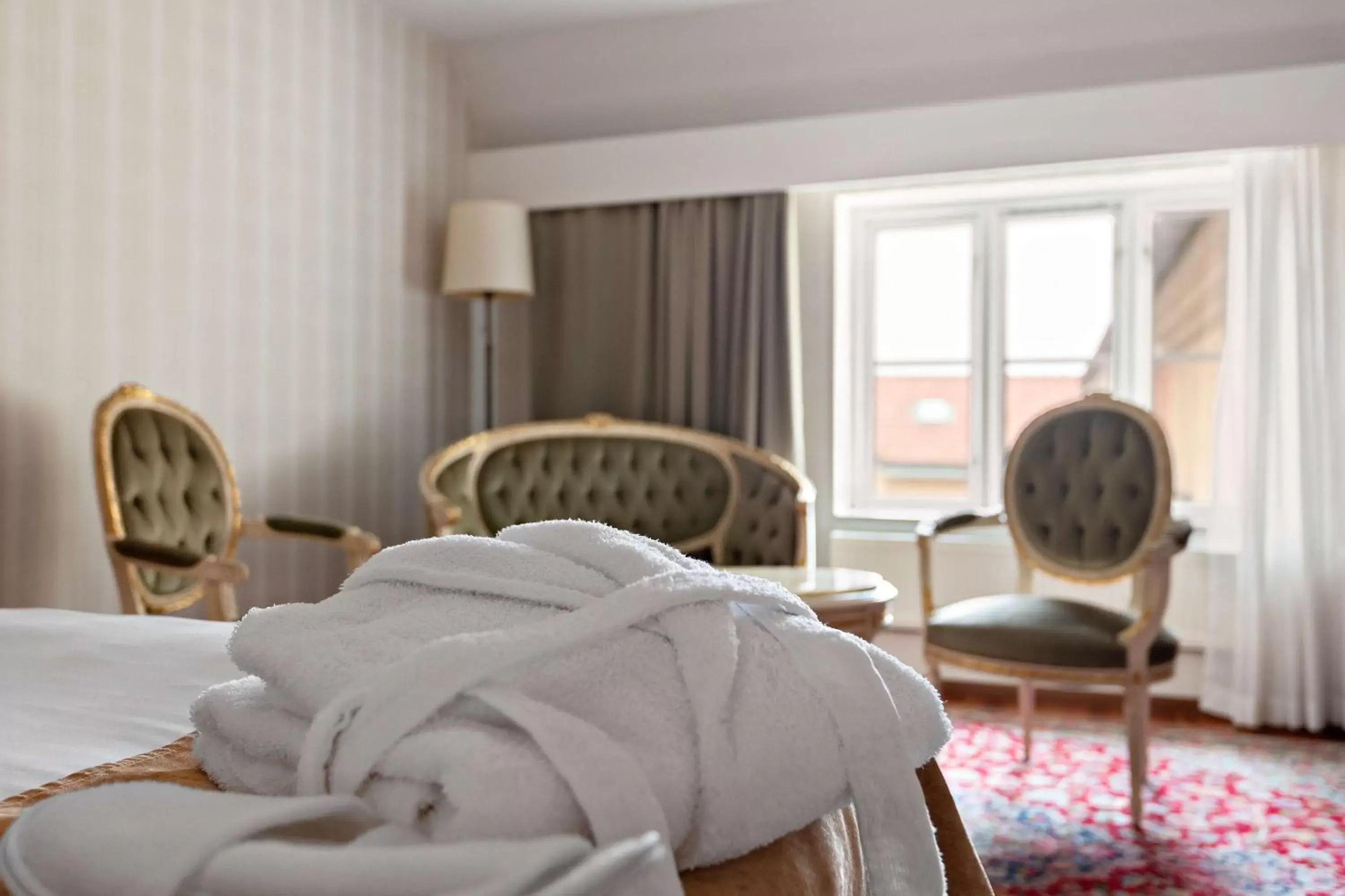 Bedroom, Seating Area in Best Western Strand Hotel