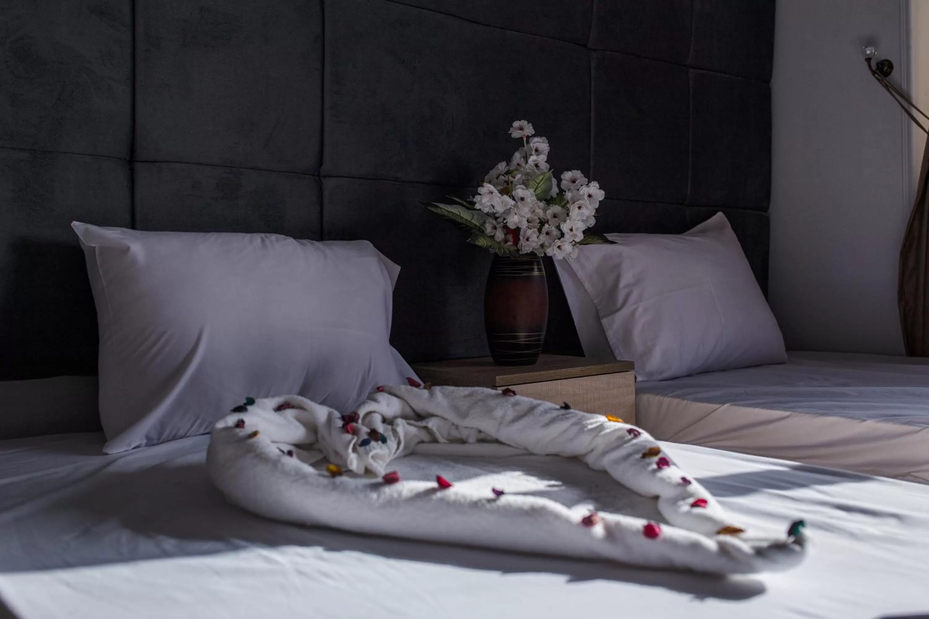 Bed in Gardenia Inn Hotel